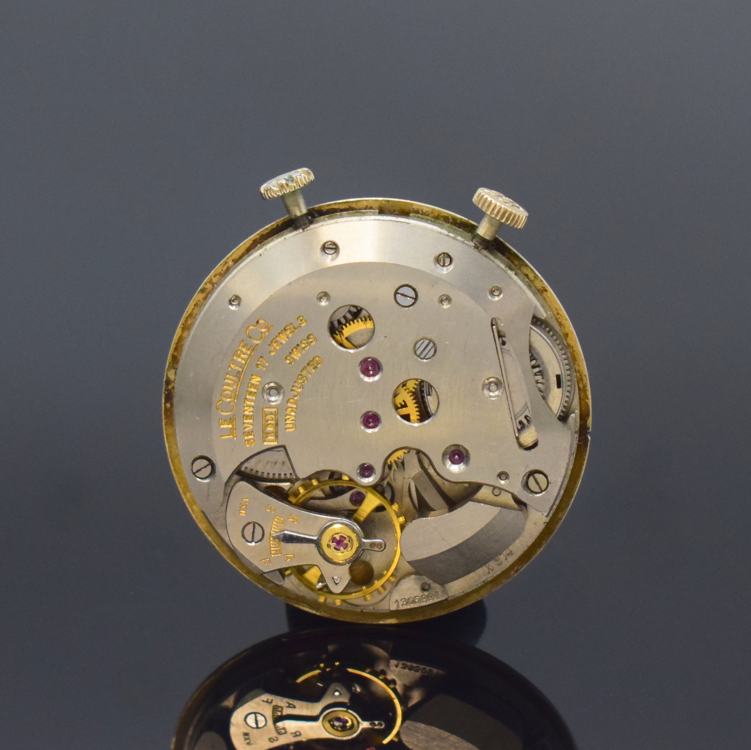 Detail e: LeCoultre Memovox Armbandwecker im 10k Gold filled Gehäuse Referenz 3024, Schweiz/USA um 1955, Handaufzug, Glasrand gedr., 2-teil. Zifferbl. m. ...