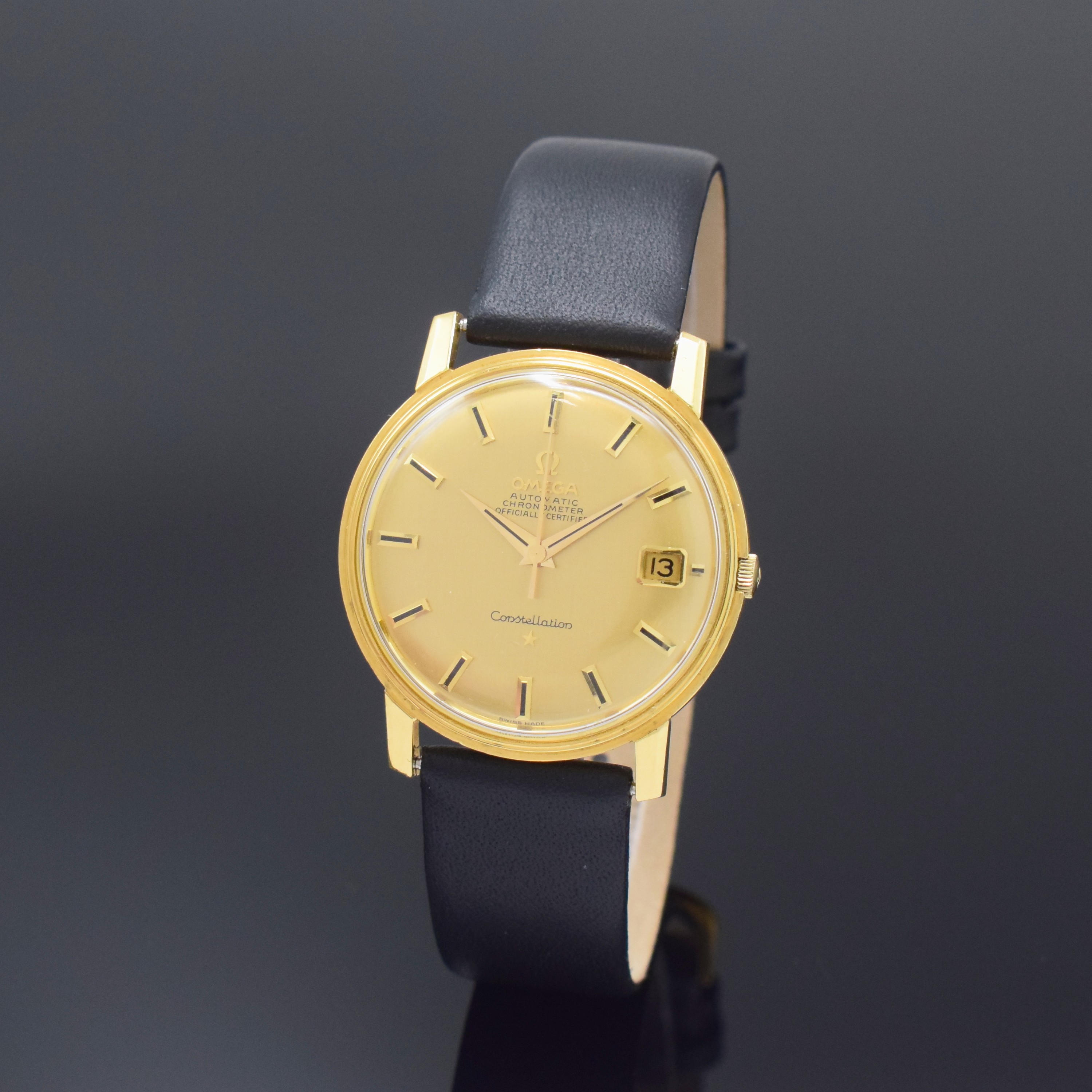 OMEGA Herrenarmbanduhr Constellation Chronometer in GG 750/000 Referenz 168.010/11, Schweiz um 1968, Boden m. Darst. Sternwarte verschr., gold. ...