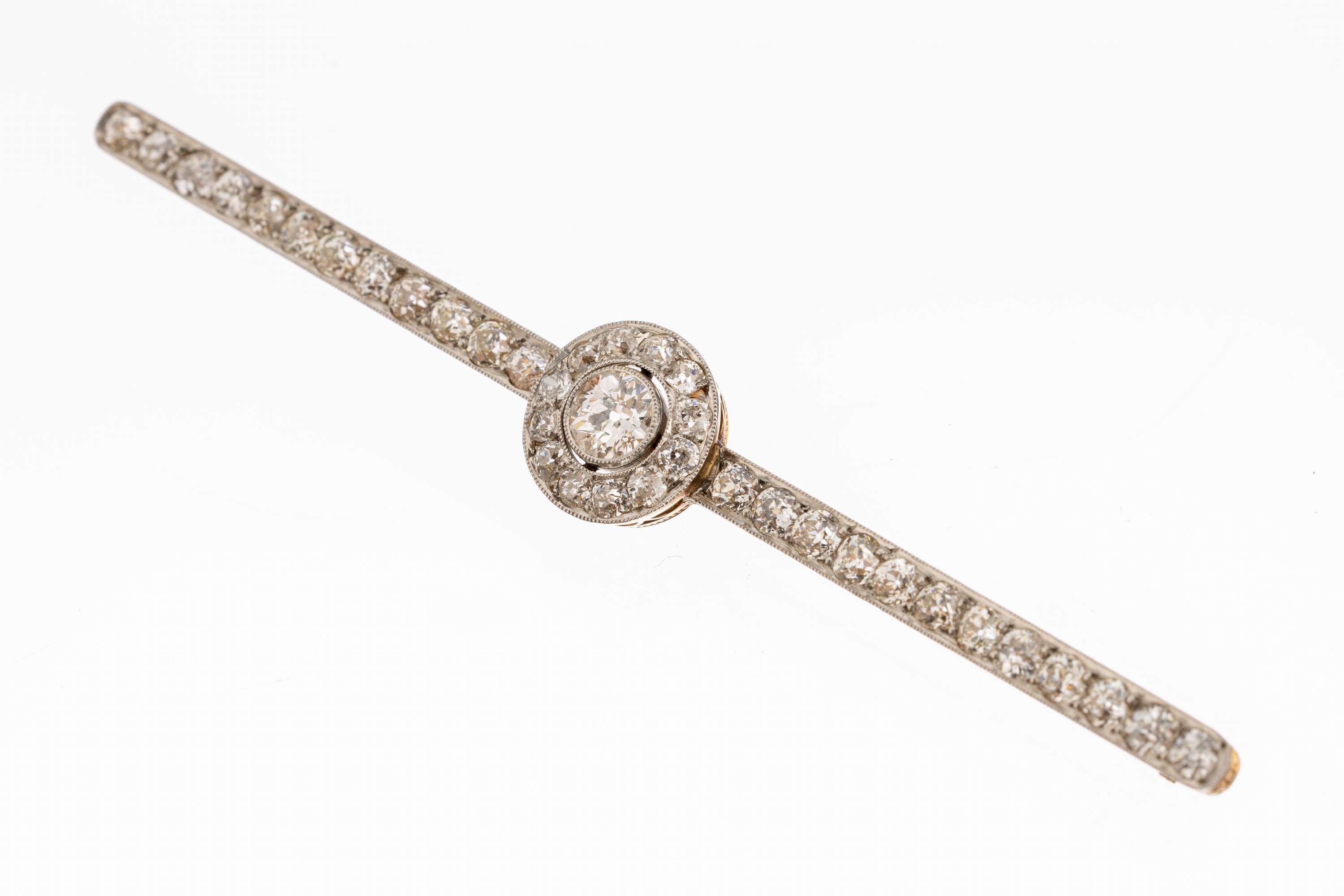 14 kt Gold Diamant-Brosche, deutsch um 1910/12, GG 585/000 und Platin, mittiger Altschliffdiamant ca. 0.40 ct Weiss- l.get.Weiss/si-p, weitere 40 ...