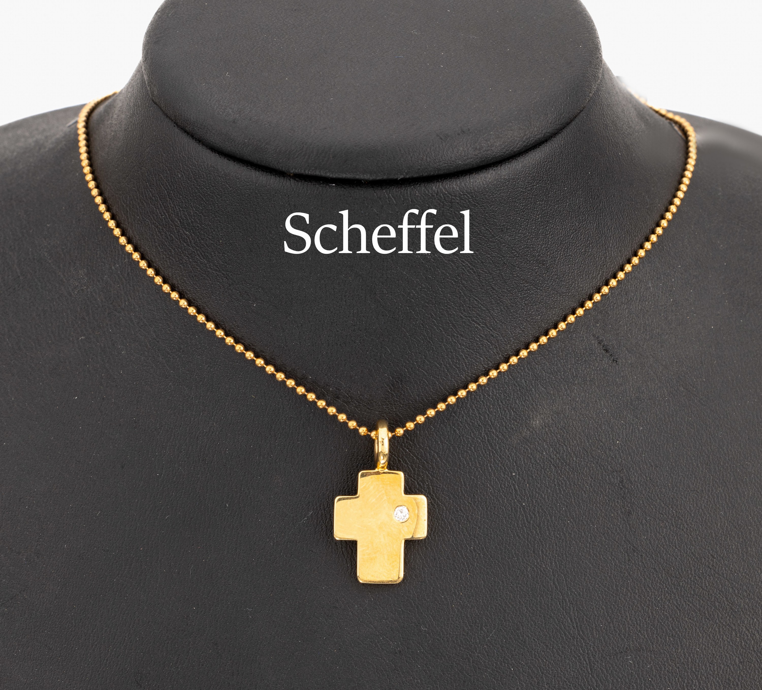 18 kt Gold SCHEFFEL Brillant-Kreuzanhänger an Kette, GG 750/000, schlicht, 1 Brillant ca.0.05 ct feines Weiß/vs, an Kugelkette, L. ca. 44 cm, ...