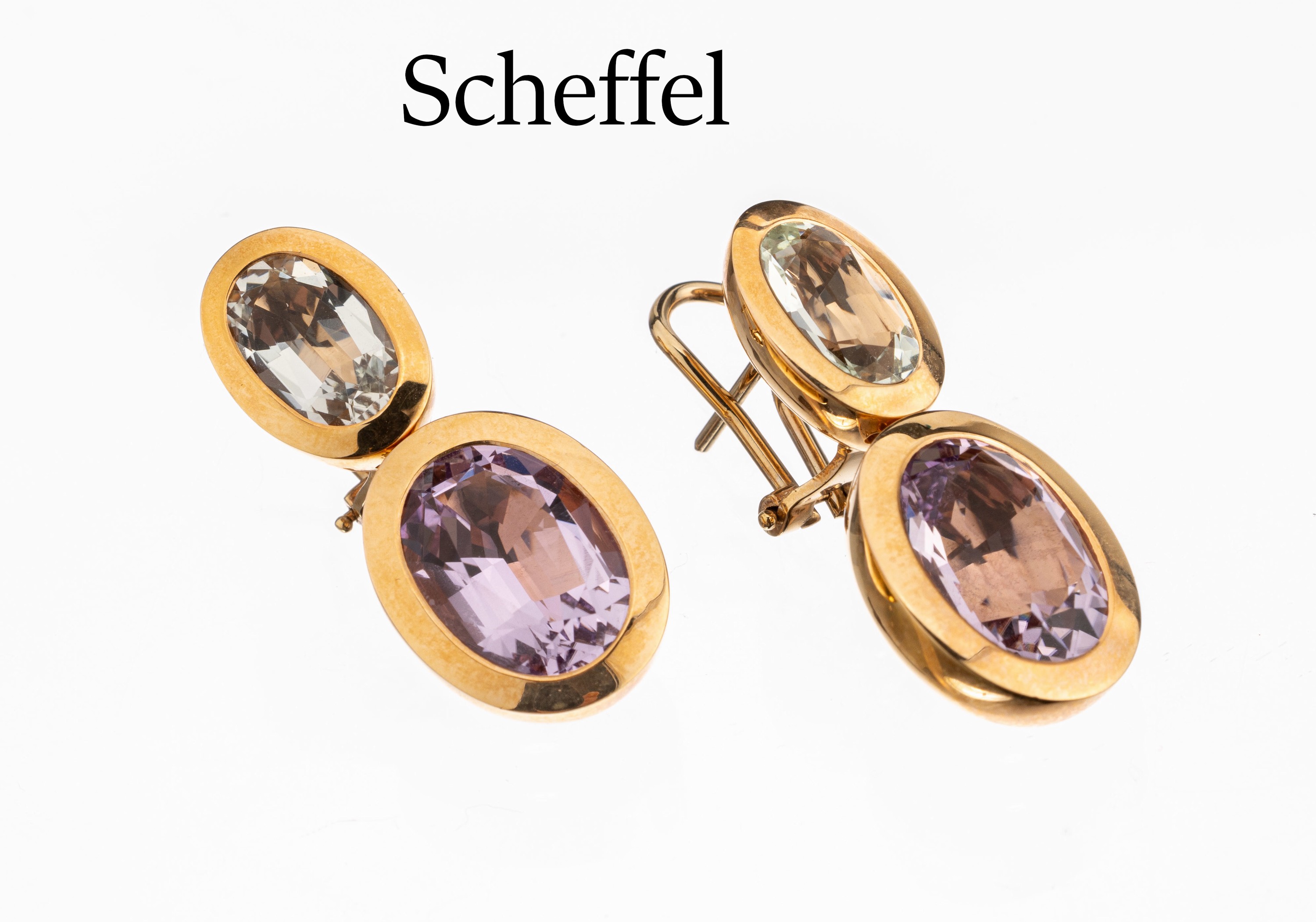 Paar 18 kt Gold SCHEFFEL Amethyst-Ohrstecker, GG 750/000, 2 ovalfacett. grünliche Amethyste zus. ca. 3.64 ct, 2 ovalfacett. Amethyste ca. 10.82 ct, ...