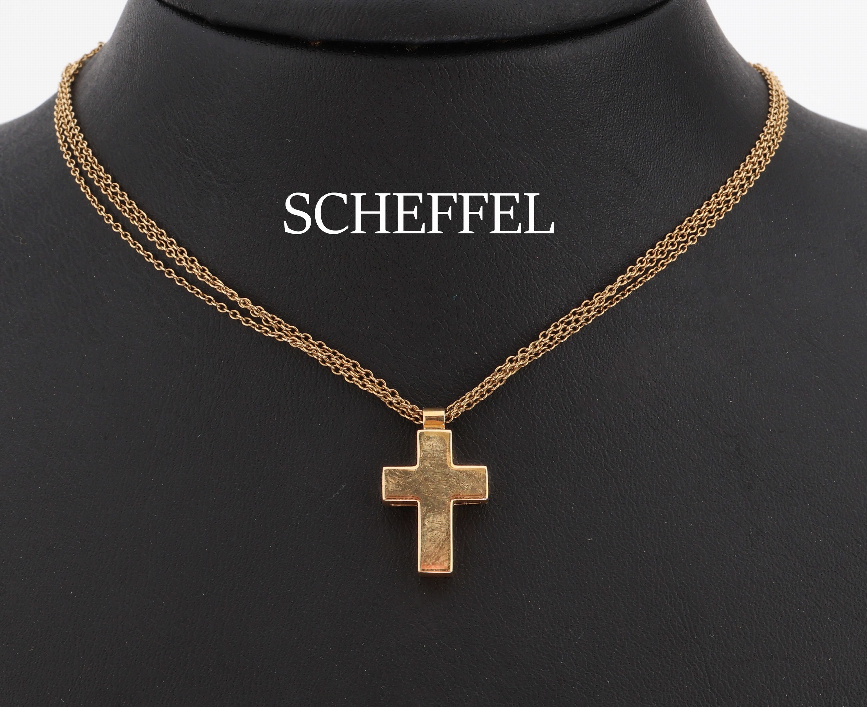 18 kt Gold SCHEFFEL Kreuzanhänger an Kette, GG 750/000, schlicht, ca. 2 x 1.4 cm, an 2-rhgKette, L. ca. 42 cm, ca. 9.5 g