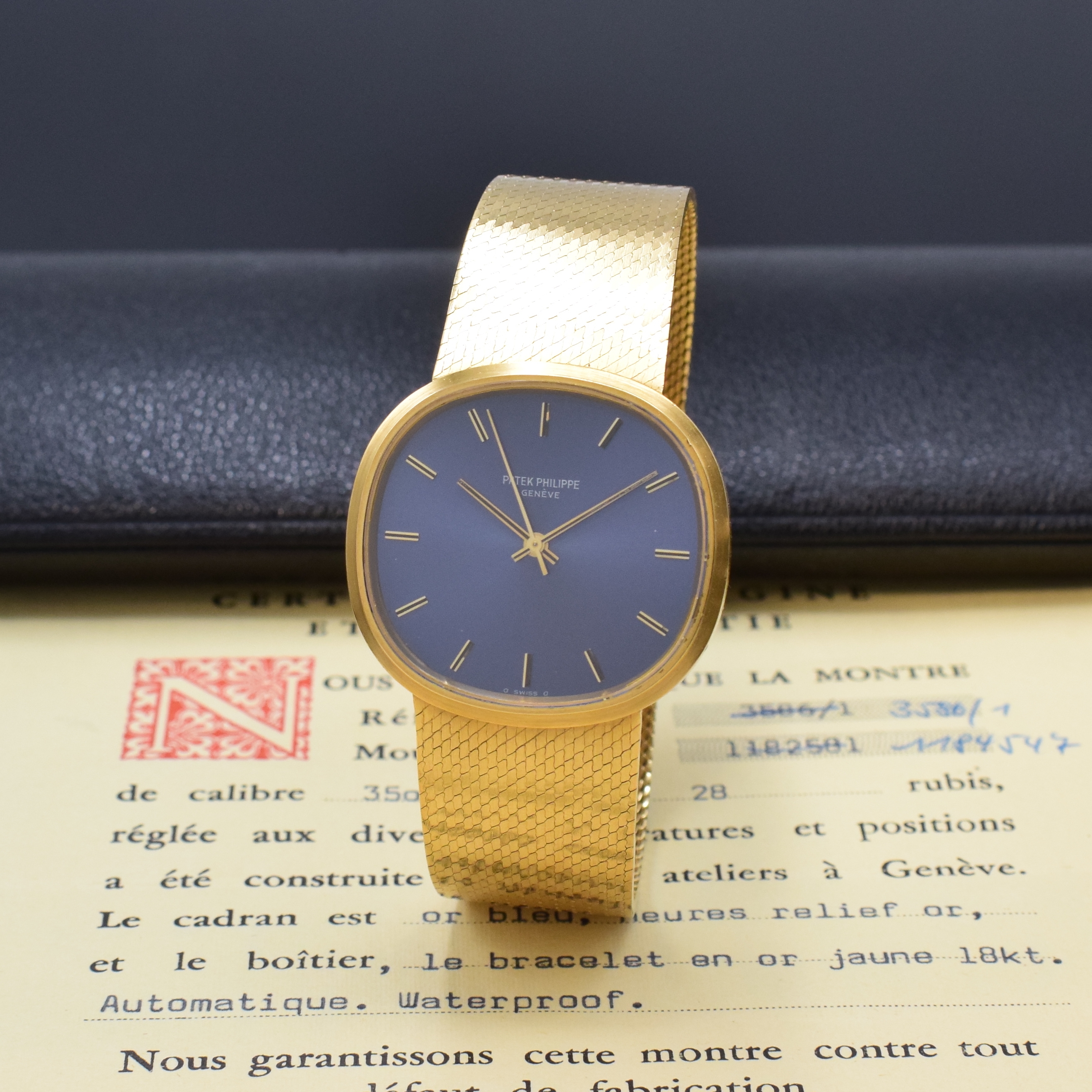 PATEK PHILIPPE Herrenarmbanduhr in GG 750/000 an Goldband Referenz 3586/1, Schweiz um 1973, Automatik, verschr. Geh., integr. orig. Milanaiseband, ...