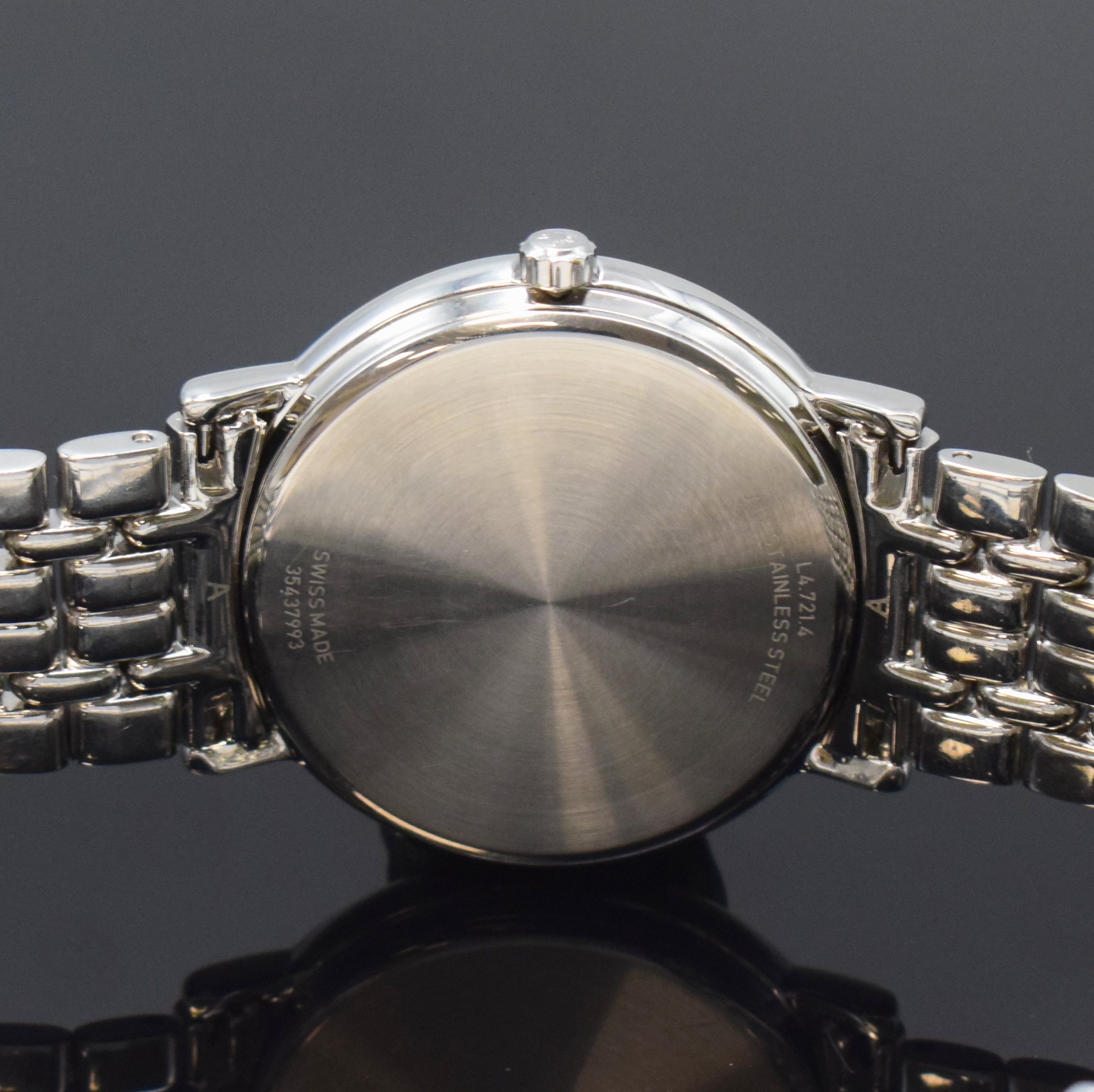 Detail d: LONGINES Elegance Armbanduhr Referenz L4.721.4, Automatik, Schweiz um 2010, Edelstahlgeh. inkl. Gliederband m. dopp. Faltschl., Saphirglas, Boden ...