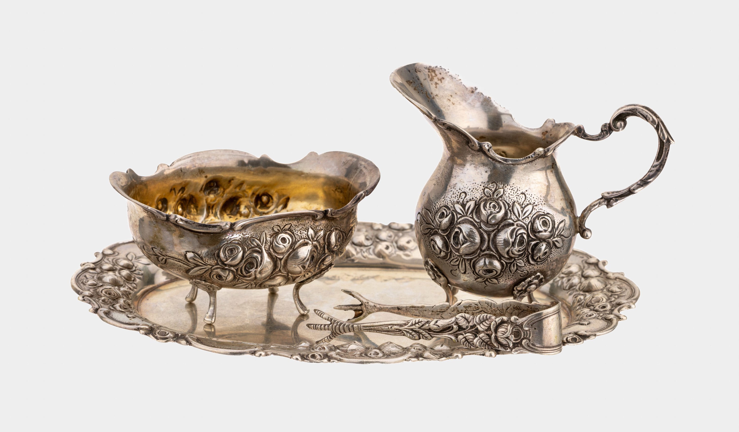 Silber Set, 800er Silber, deutsch, wohl Hanau um 1900, best. aus: Tablett, ca. 19 x 13cm, 1 Sahnegiesser, H. ca. 8 cm, 1 Zuckergefäss und 1 ...