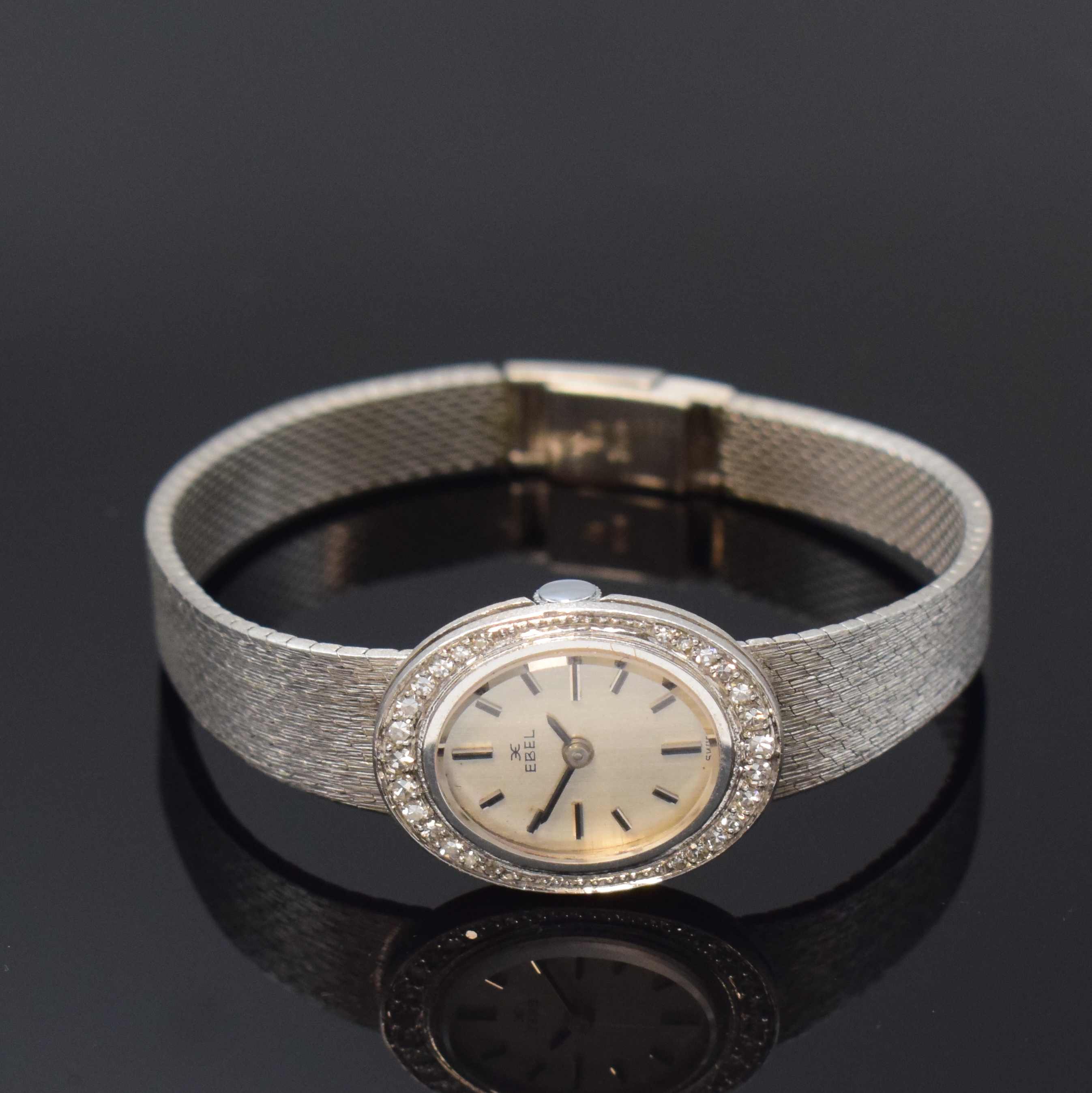 EBEL feine Damenarmbanduhr in WG 750/000 mit Diamanten, Schweiz um 1965, Handaufzug, Boden aufgedr., Lünette aufw. m. Diamanten bes., silb. ...
