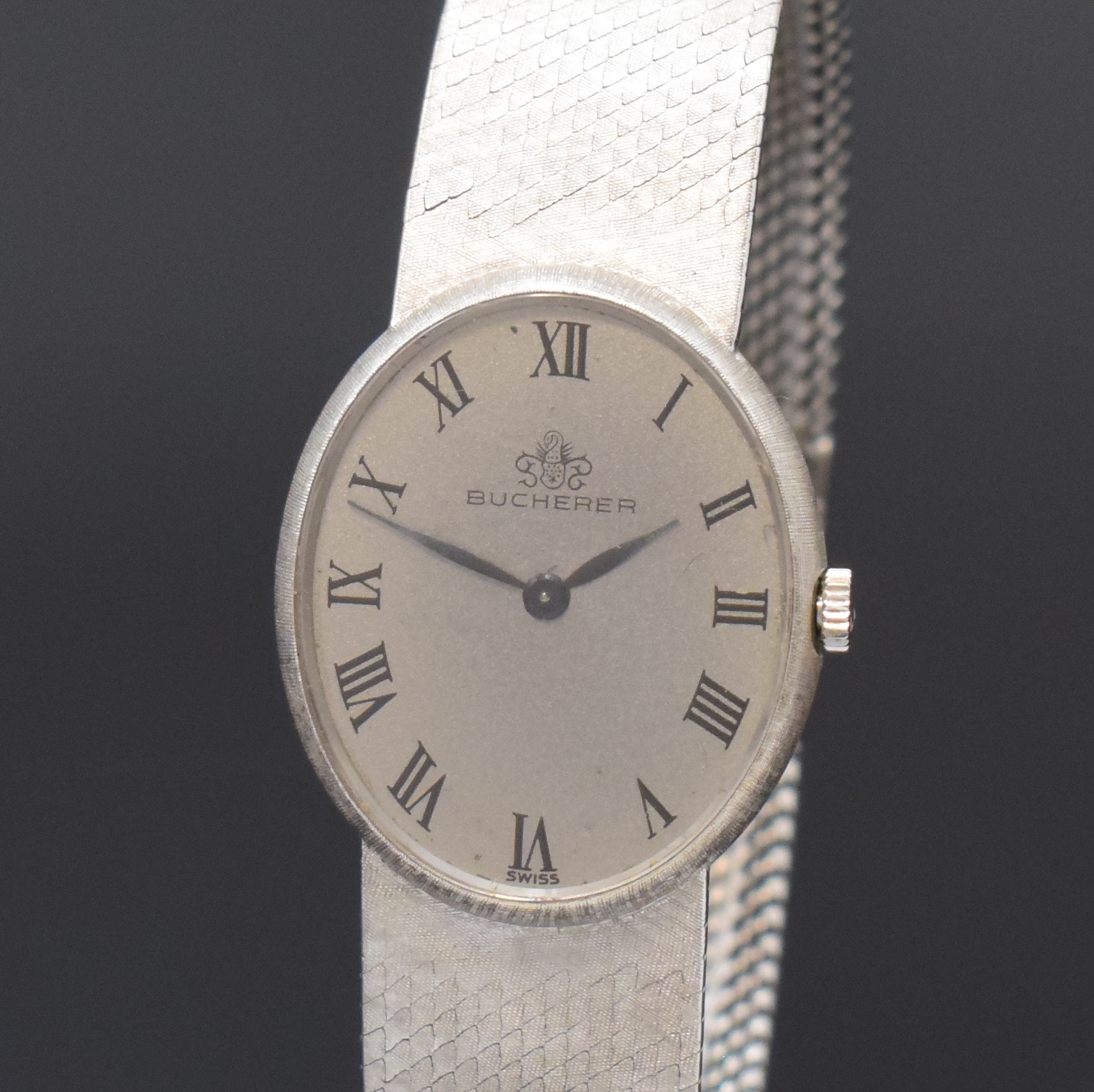 Detail a: BUCHERER / CHOPARD Damenarmbanduhr in WG 750/000 Referenz 5029, Handaufzug, Schweiz um 1970, Boden aufgedr., silb. Strukturzifferbl. m. röm. Std., ...