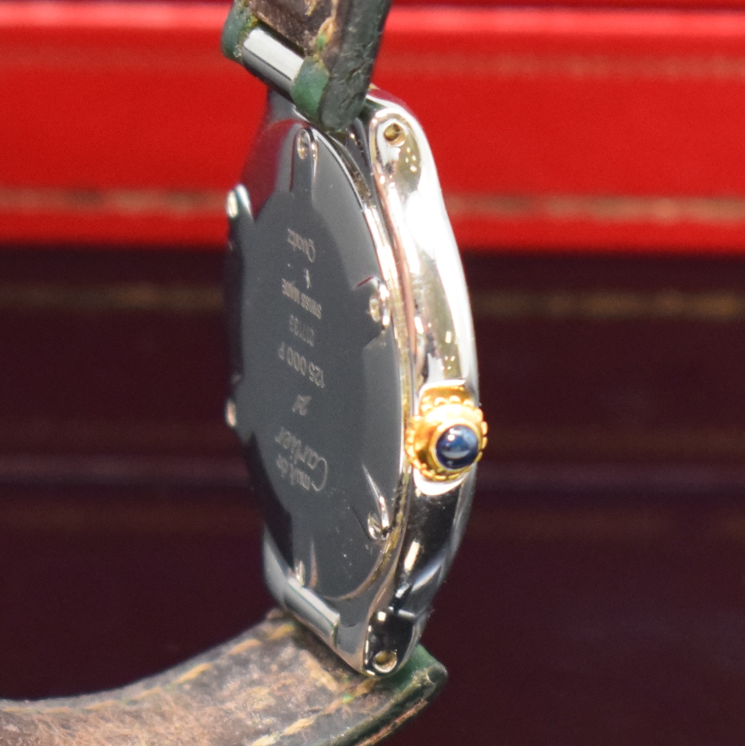 Detail c: CARTIER 21 Damenarmbanduhr in Stahl/Gold Referenz 125000P, Schweiz um 1995, quartz, 6-fach verschr. Geh., breite Lünette m. gold. röm. Zahlen, ...
