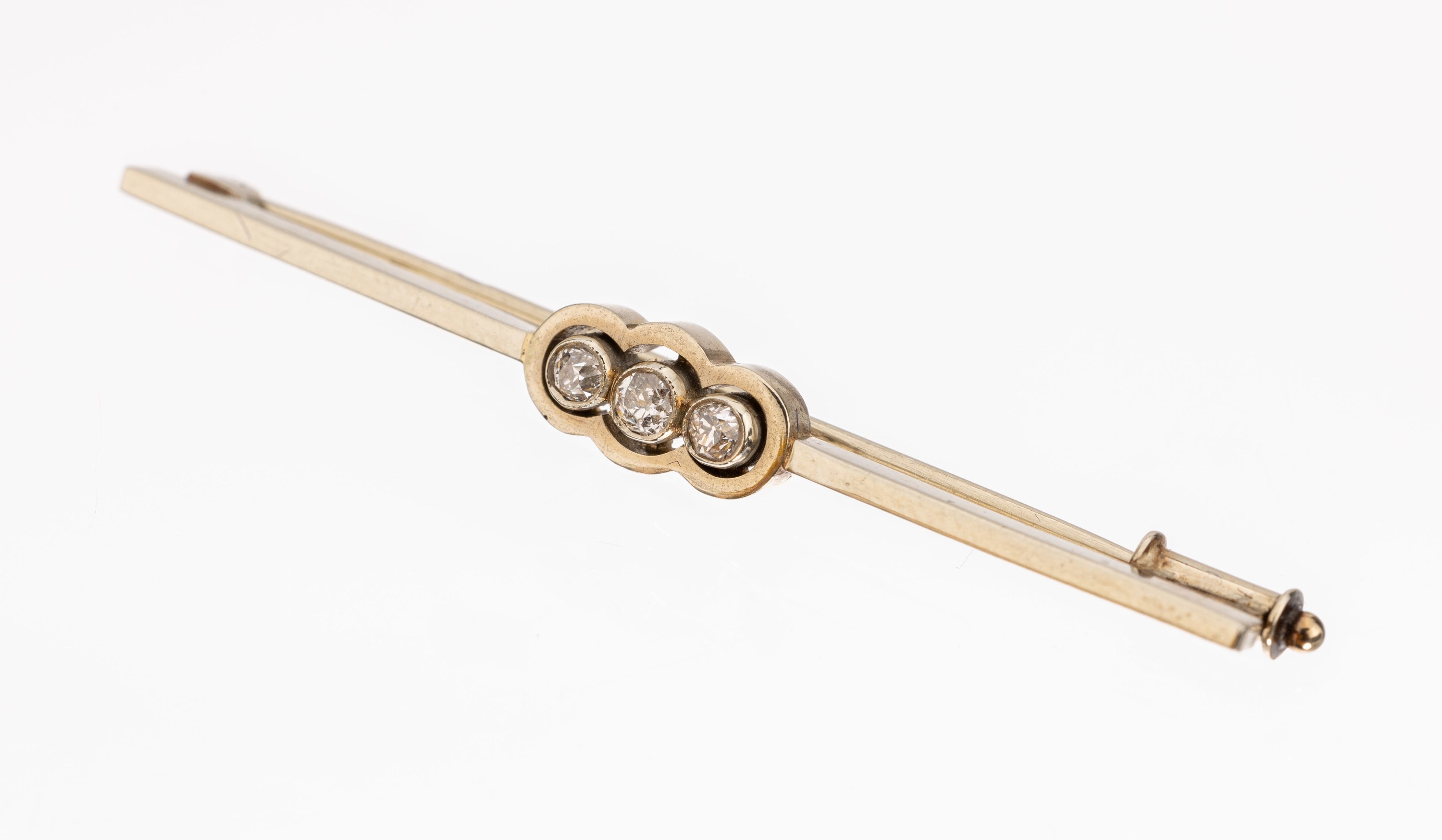 14 kt Gold Diamant-Brosche, um 1920-30, WG 585/000, Niederlande, L. ca. 5 cm, 3 Altschliffdiamanten zus. ca. 0.12 ct Weiss/si, ca. 3.1 g