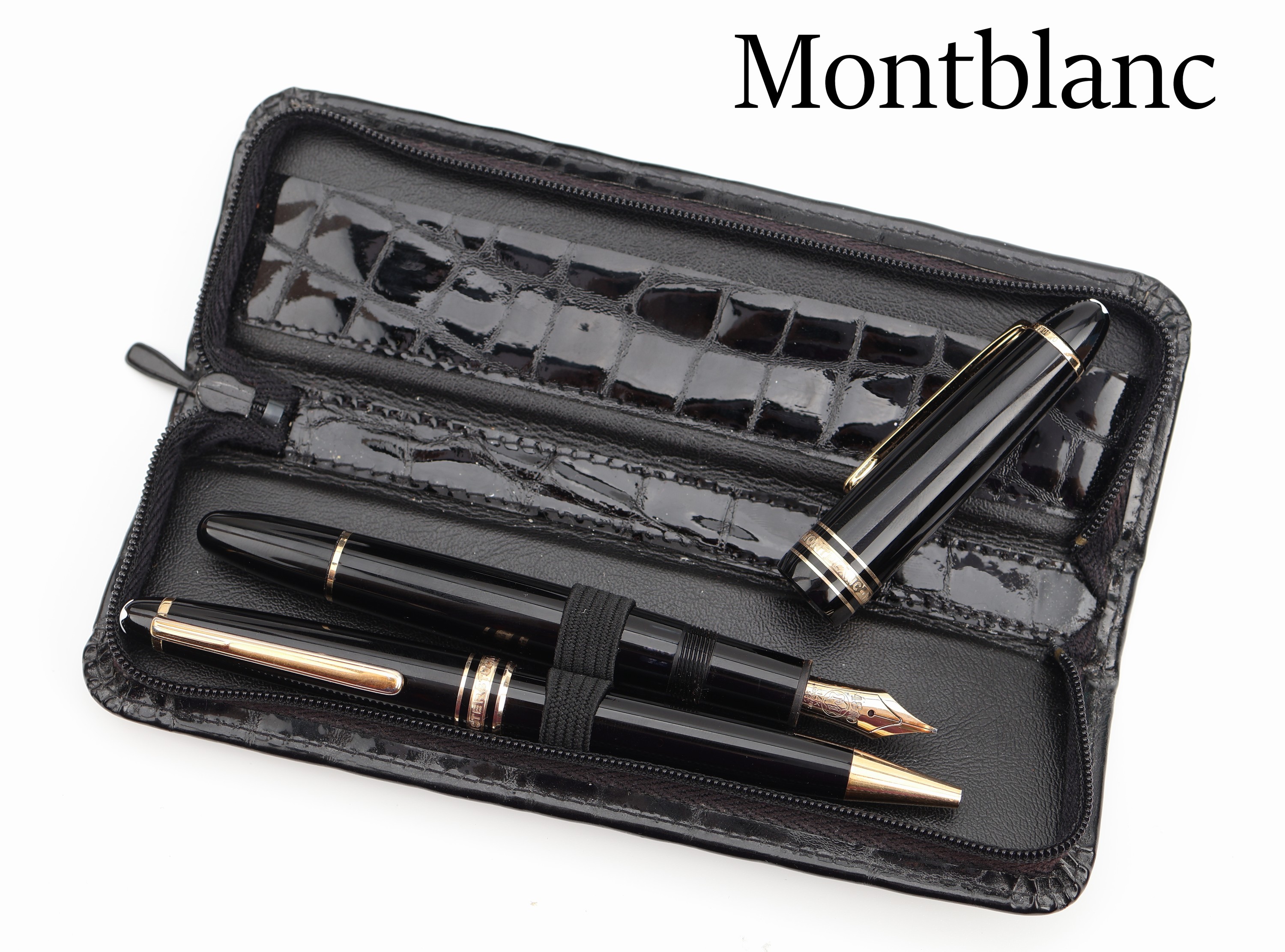 MONTBLANC Meisterstück Schreibset, best. aus: 1 Kugelschreiber und 1 Füllfederhalter, Korpus und Kappe schwarzer Edelharz, Monturen Metall verg., ...