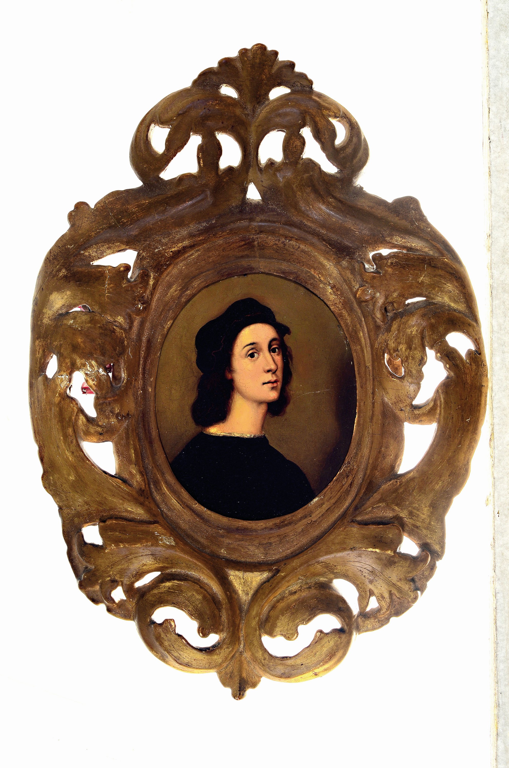 2 Kopien nach Raffael und Giulio Romano, 19.Jh., Öl/Holz, je Porträt eines jungen Mannes, ovaler Bildträger, je mit Akanthusrahmen, Bild 16x14 cm, ...