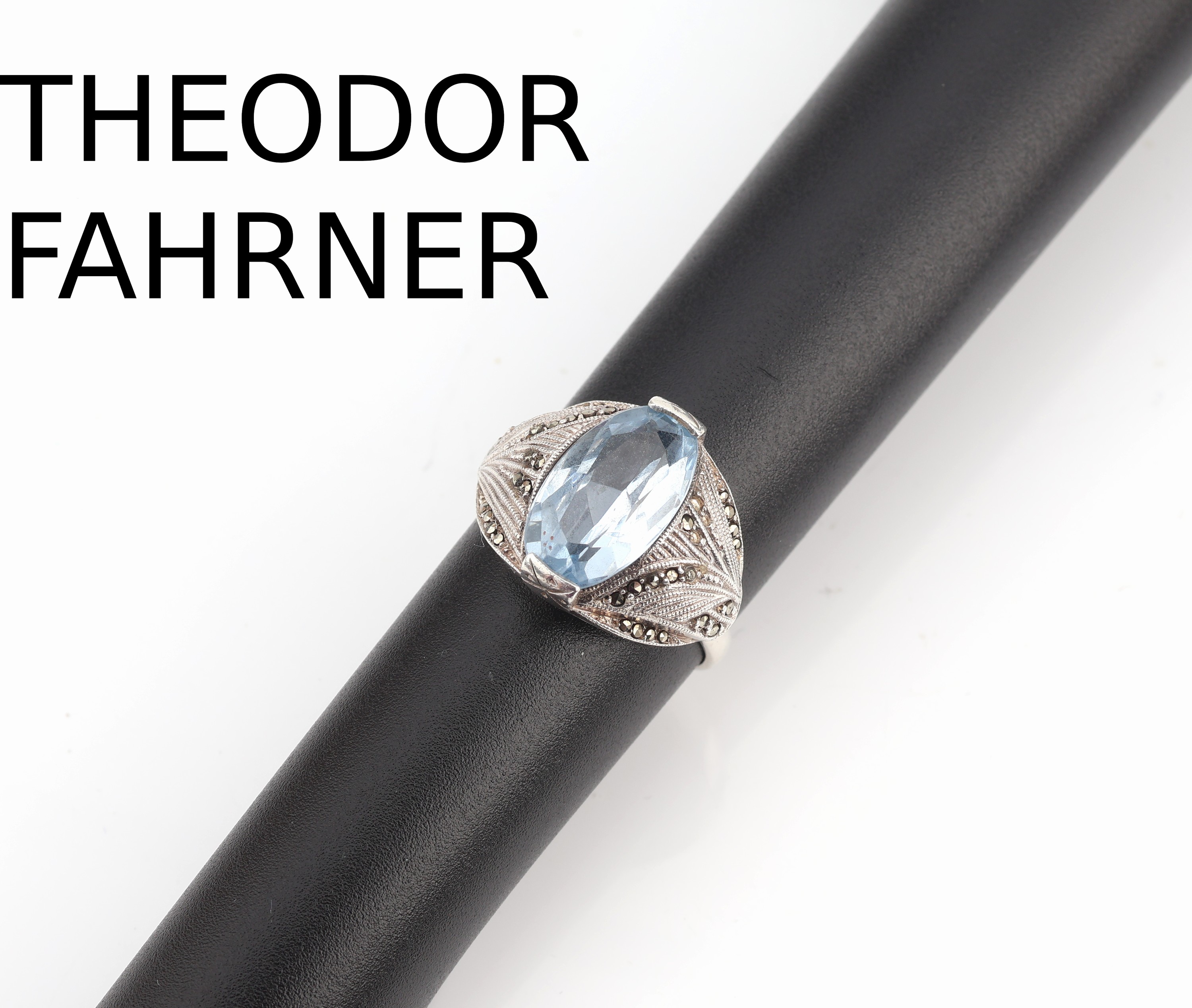 THEODOR FAHRNER Ring, 925er Silber, 1930er Jahre, ovalfacett. Blautopas (beh.), Markasitbesatz (einige fehlen), RW 55