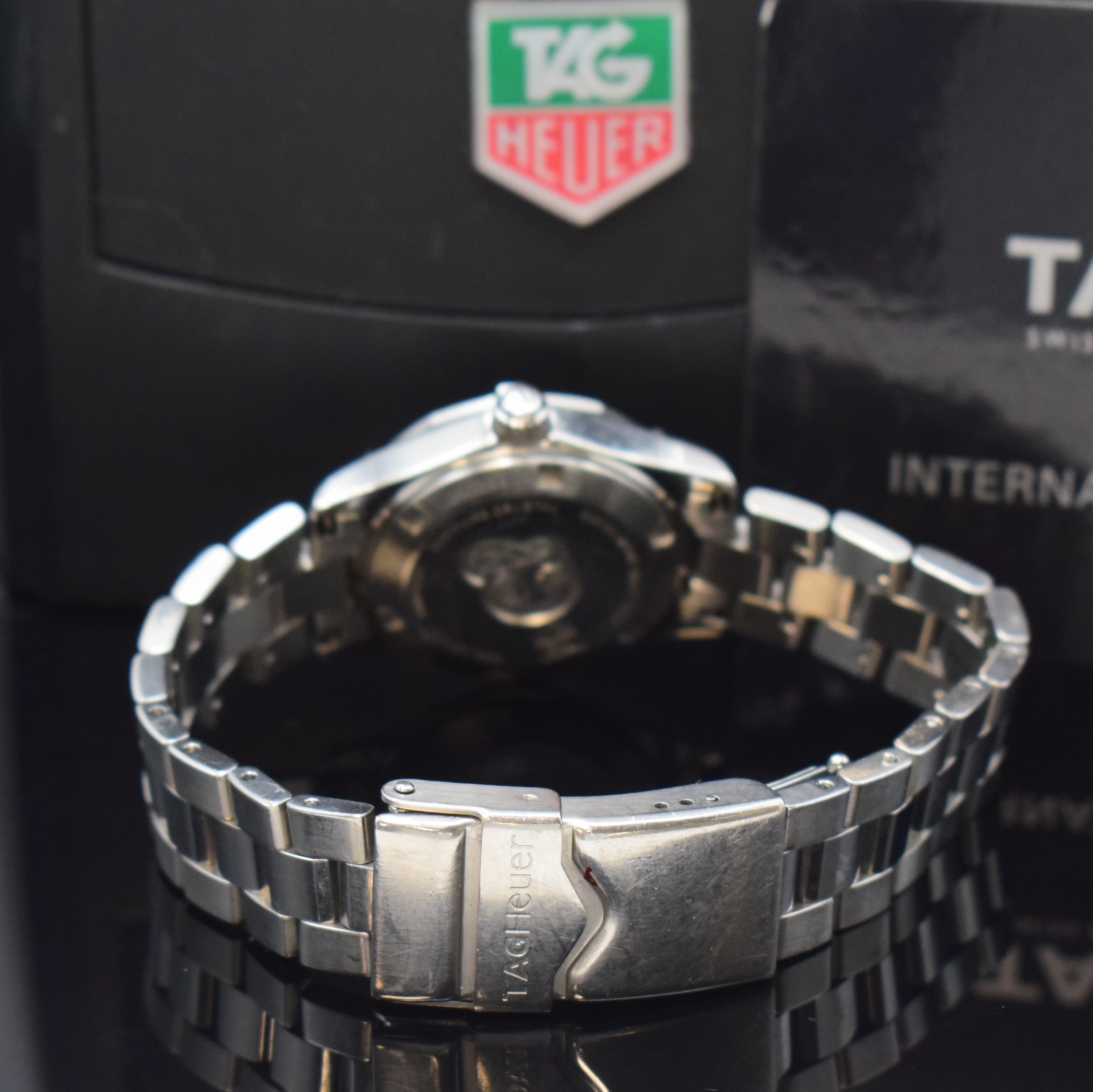 Detail b: TAG HEUER Damenarmbanduhr Modell Aquaracer Referenz WAF1412, Edelstahlgeh. inkl. Gliederband m. Faltschl., Boden und Krone verschr., ab Herst. ...