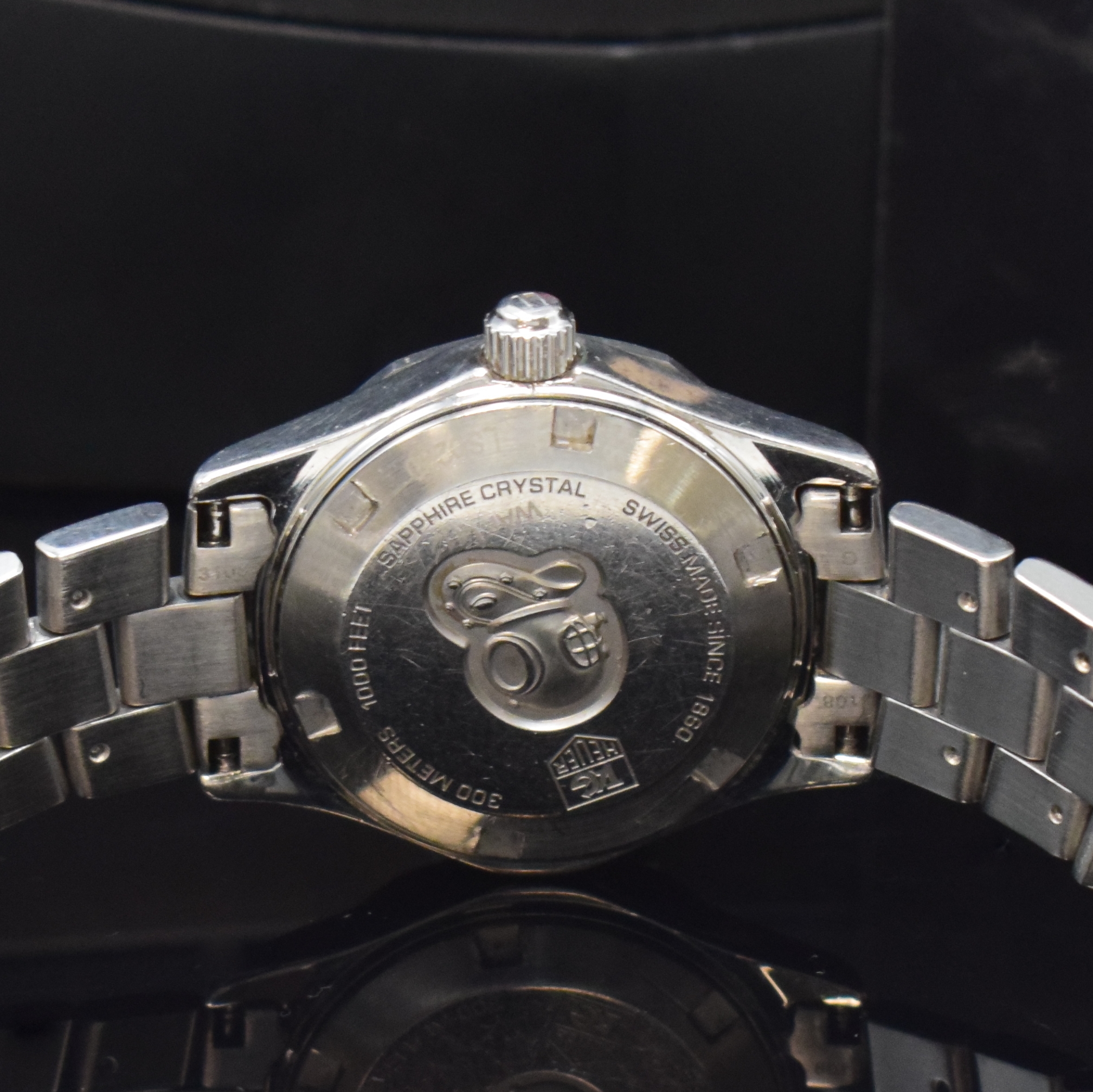 Detail d: TAG HEUER Damenarmbanduhr Modell Aquaracer Referenz WAF1412, Edelstahlgeh. inkl. Gliederband m. Faltschl., Boden und Krone verschr., ab Herst. ...