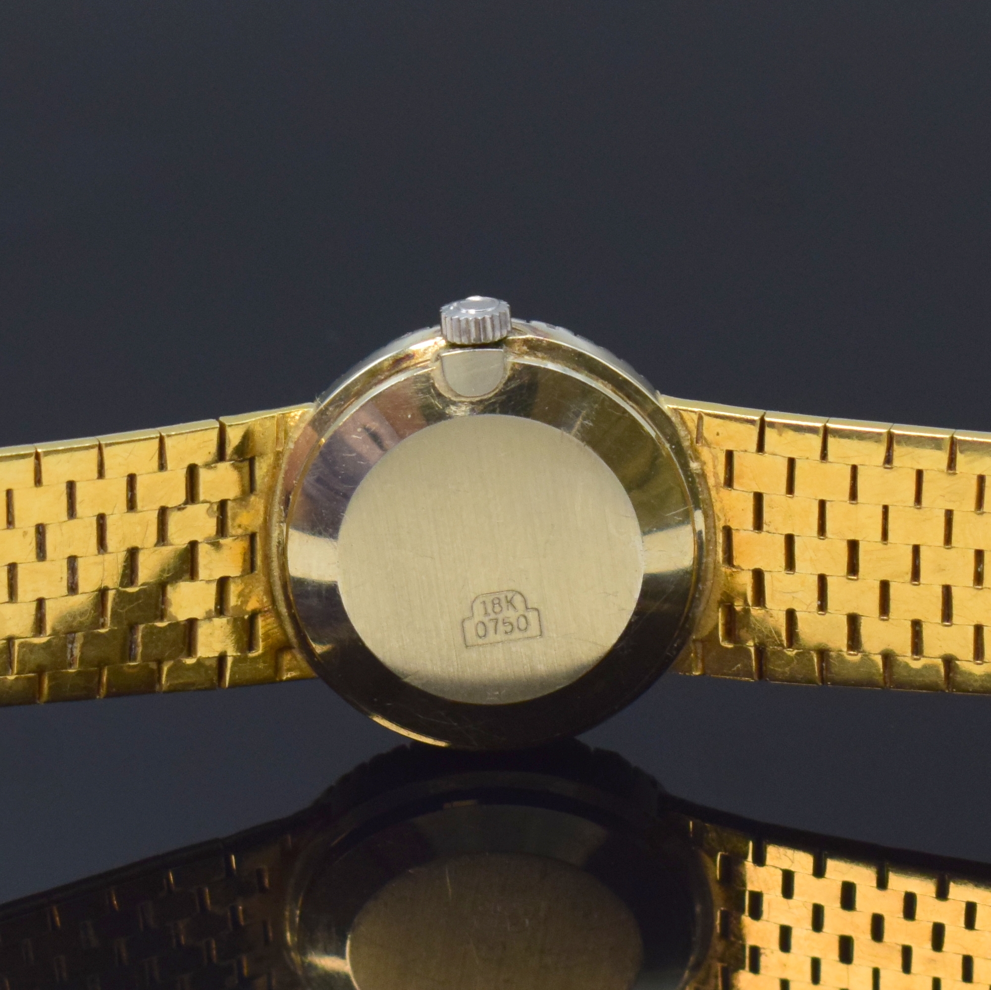 Detail d: OMEGA Diamant-besetze Damenarmbanduhr in GG 750/000, Schweiz um 1970, Handaufzug, NEUTRALES Geh. u. Band, Boden aufgedr., silb. Zifferbl., gold. ...