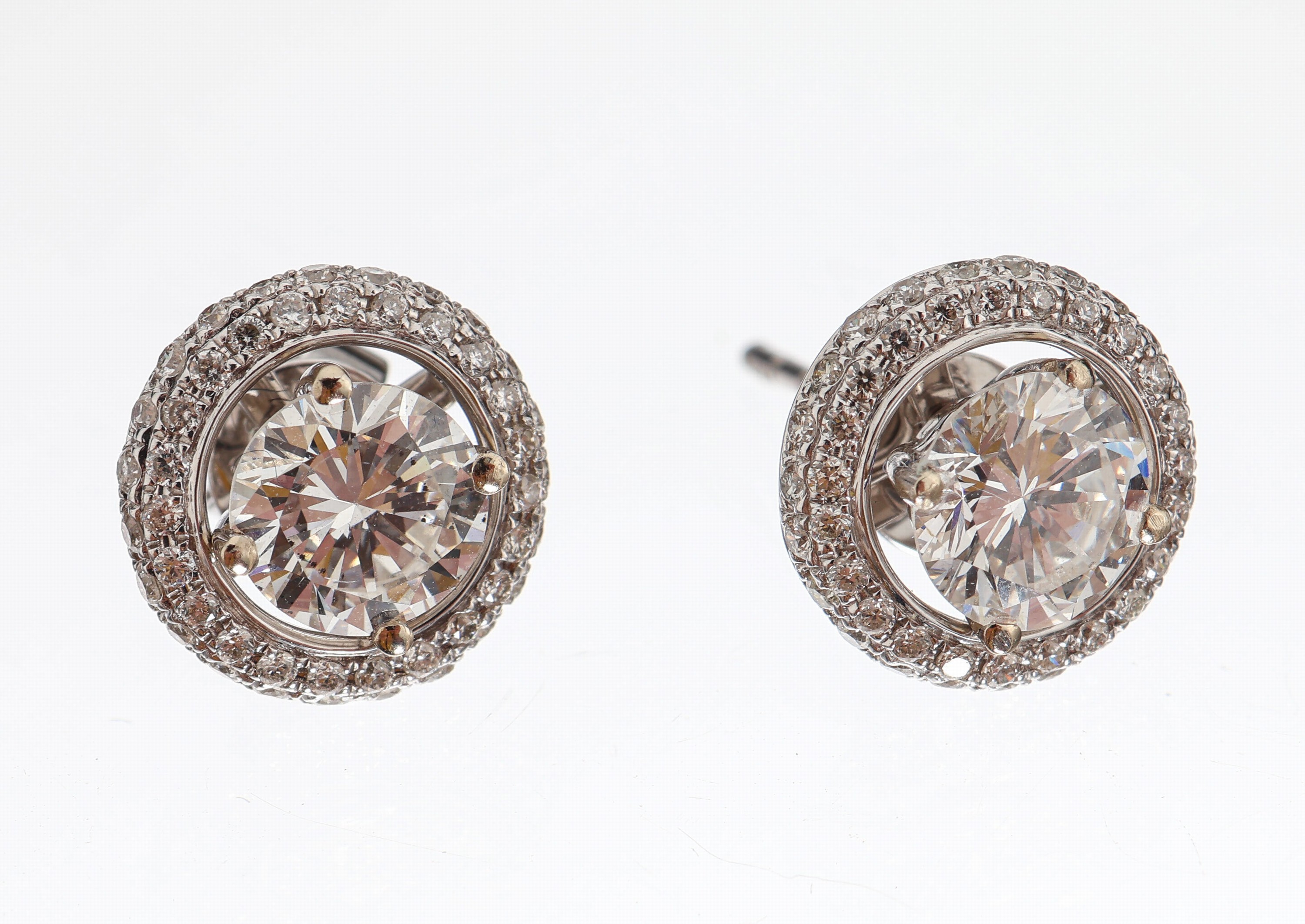 Paar 18 kt Gold Brillant-Ohrstecker, WG 750/000, 2 Brillanten zus. ca. 1.30 ct Weiß/si, abnehmbare Kränze mit Brillanten zus.ca. 0.37 ct Weiß/si, ...