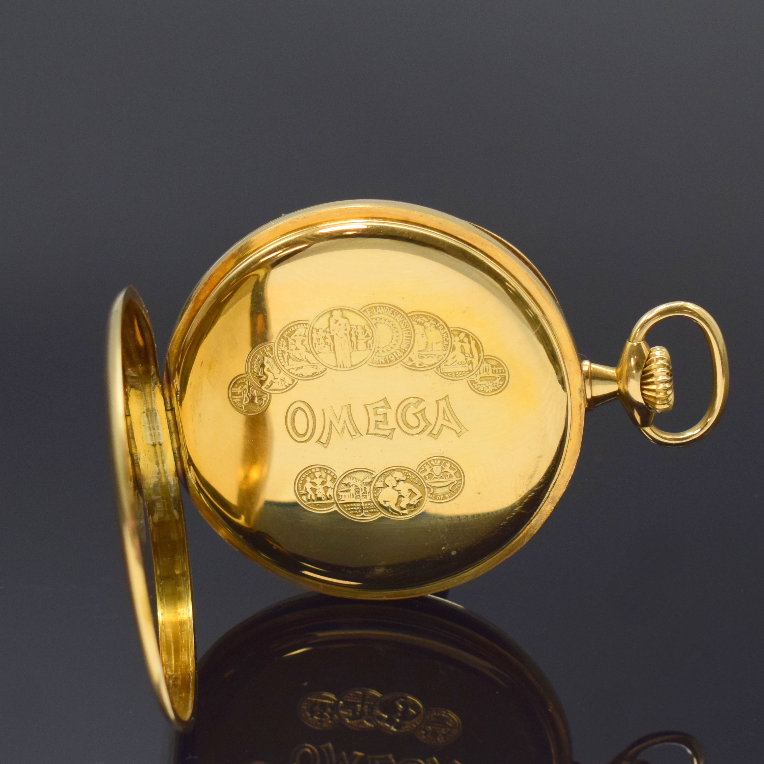 Detail c: OMEGA Frackuhr in GG 750/000, Schweiz um 1916, glattes 2-Deckel Goldgeh. dell., Cuvette m. Medaillengrav., gold. Zifferbl., schwarz. Breguetzahlen, ...