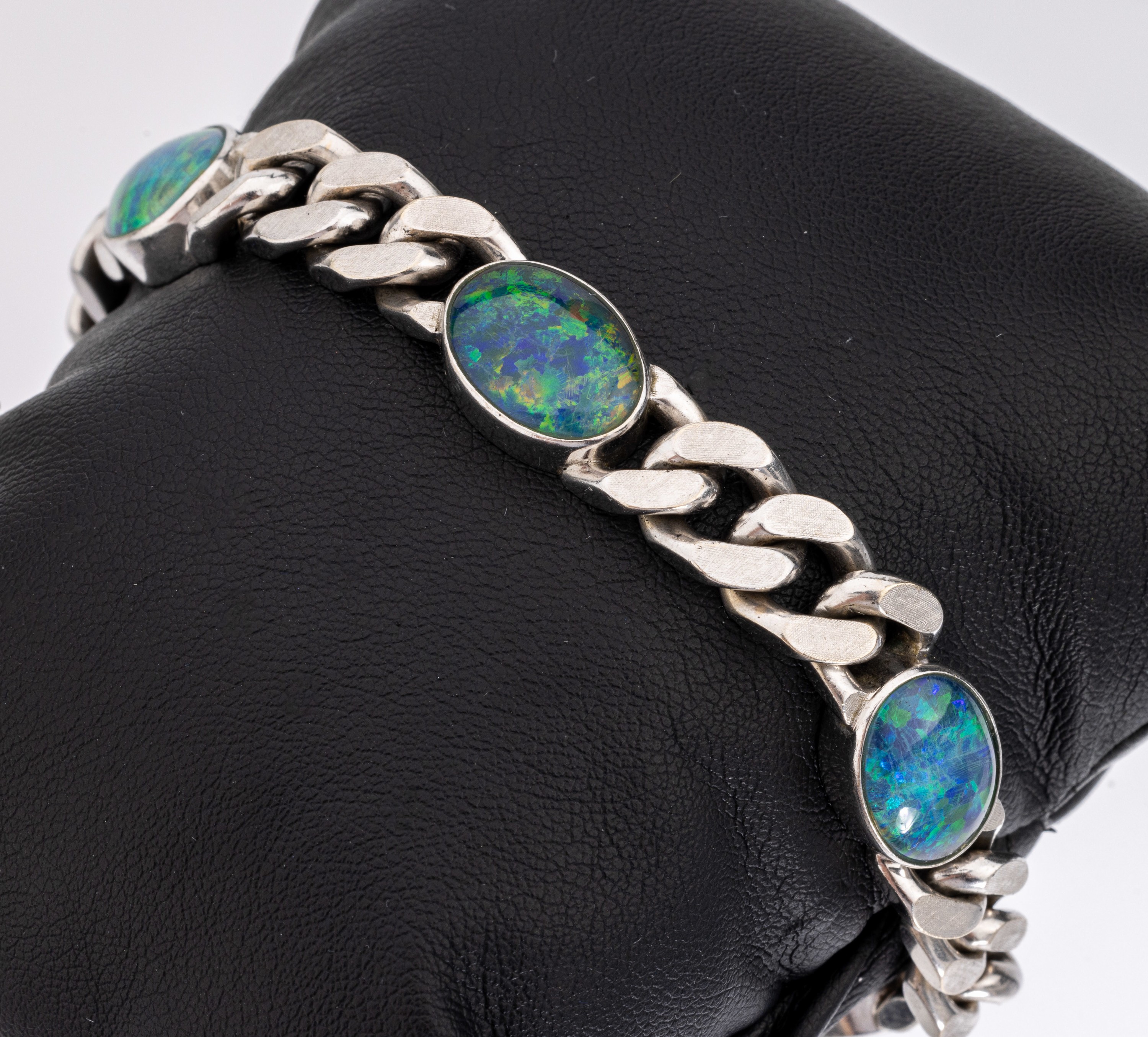 14 kt Gold Opal-Armband, WG 585/000, Oberfläche fein sat., 5 Zwischenglieder mit Opaltripletten, schönes Farbspiel, L. ca. 20 cm, Kastenschloss ...