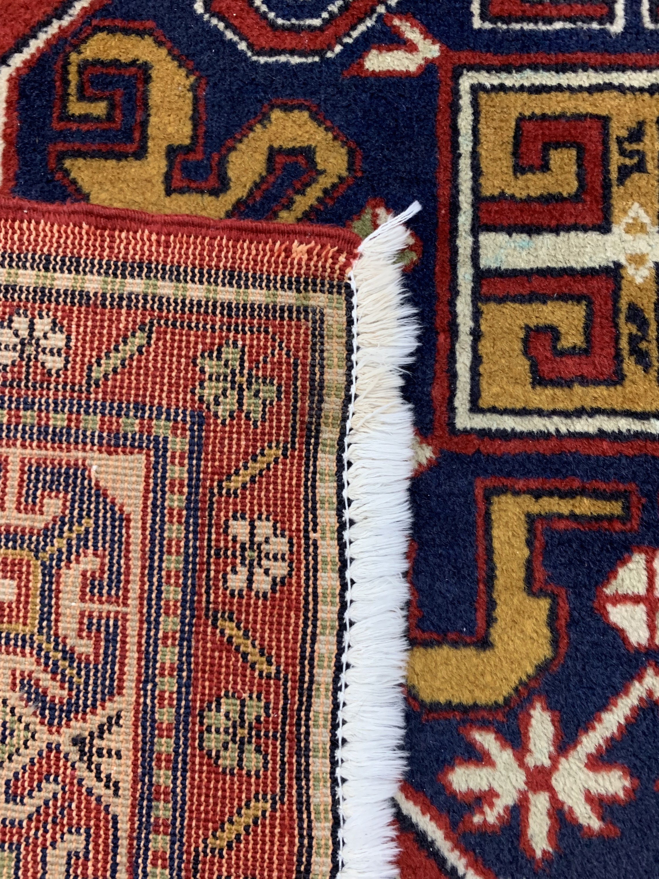 Detail e: "Wolkenband-Kazak"Motiv Türkei, Mitte 20.Jhd, Wolle auf Baumwolle, ca. 204 x 132 cm EHZ: 2-3