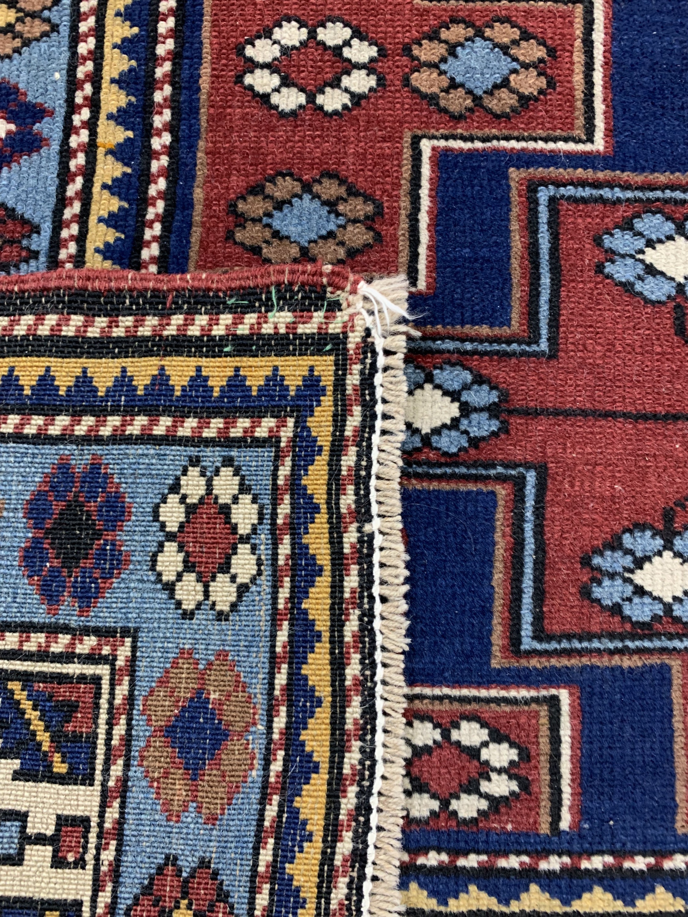 Detail f: "Derbent"Kazak, Rußland, Mitte 20.Jhd, Wolle auf Wolle, ca. 190 x 132 cm, EHZ: 2-3