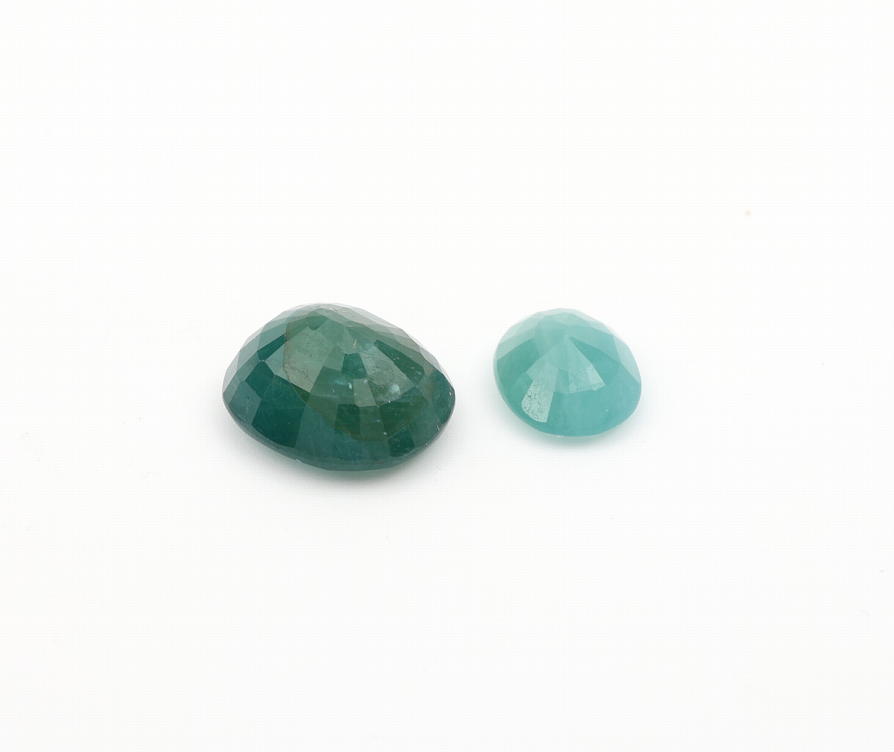 Detail a: Konvolut 2 ovalfacett. Grandidierte: 1 x ca. 3.36 ct, 11.49 x 9.01 x 4.96 mm; 1 x ca. 9.63 ct, 12.56 x 7.53 mm, jew. mit GEMReport