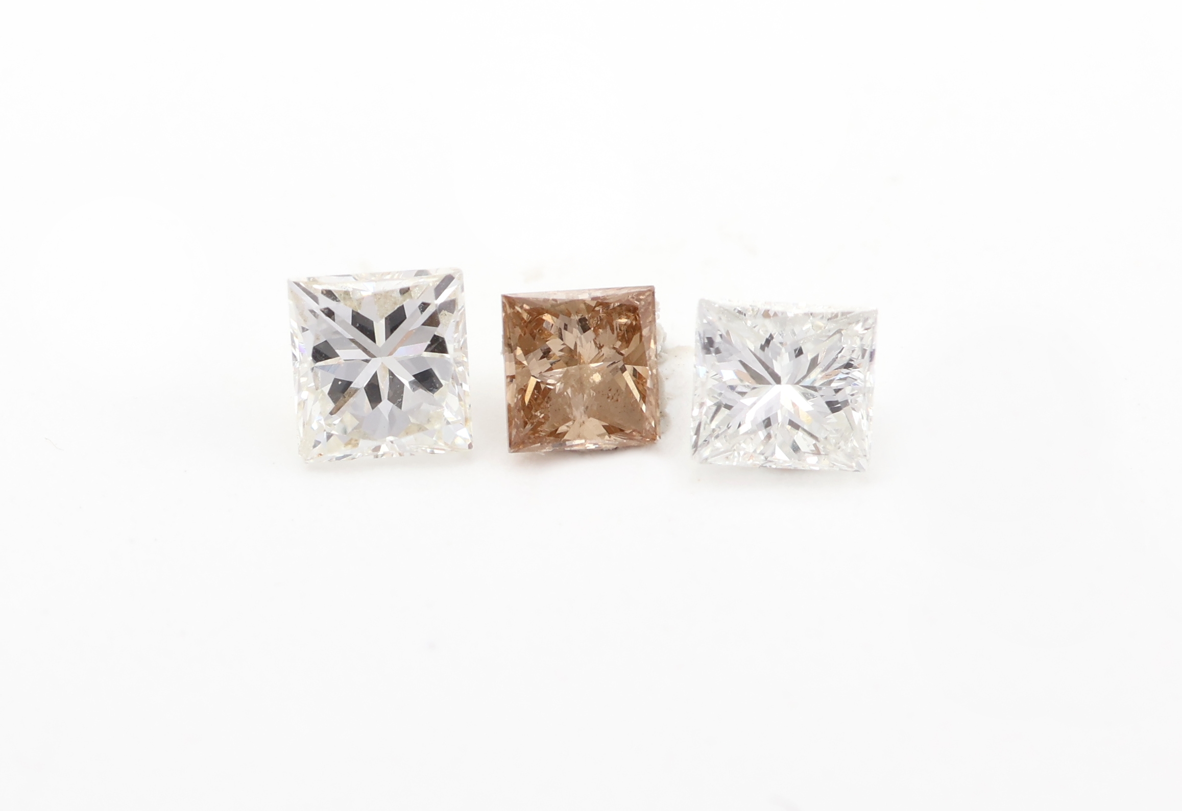 Lot 3 lose Diamanten, zus. 0.58 ct im Princess Cut