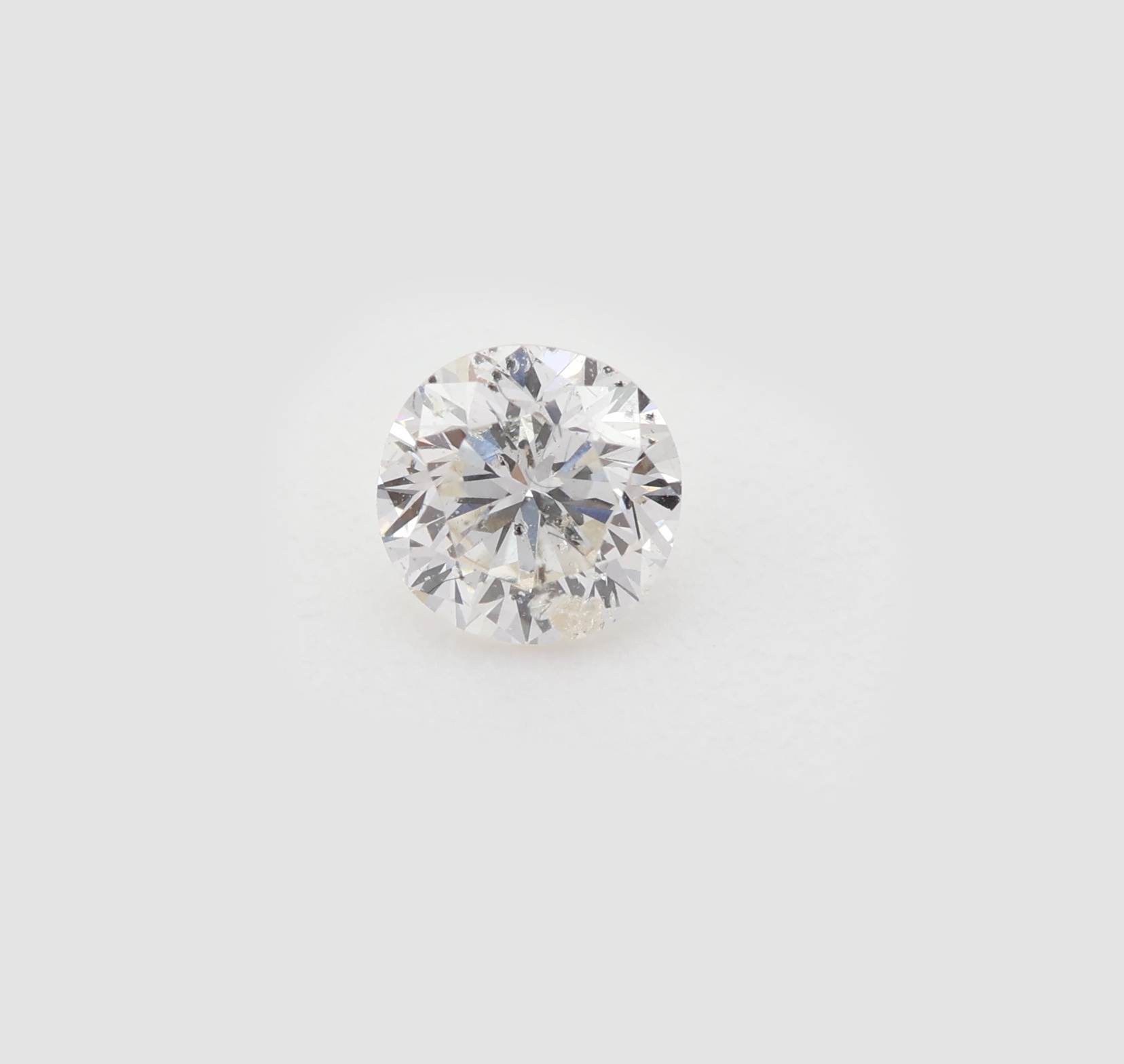 Detail b: Loser Brillant, 0.21 ct, Weiss(H)/p2, mit GIA Expertise