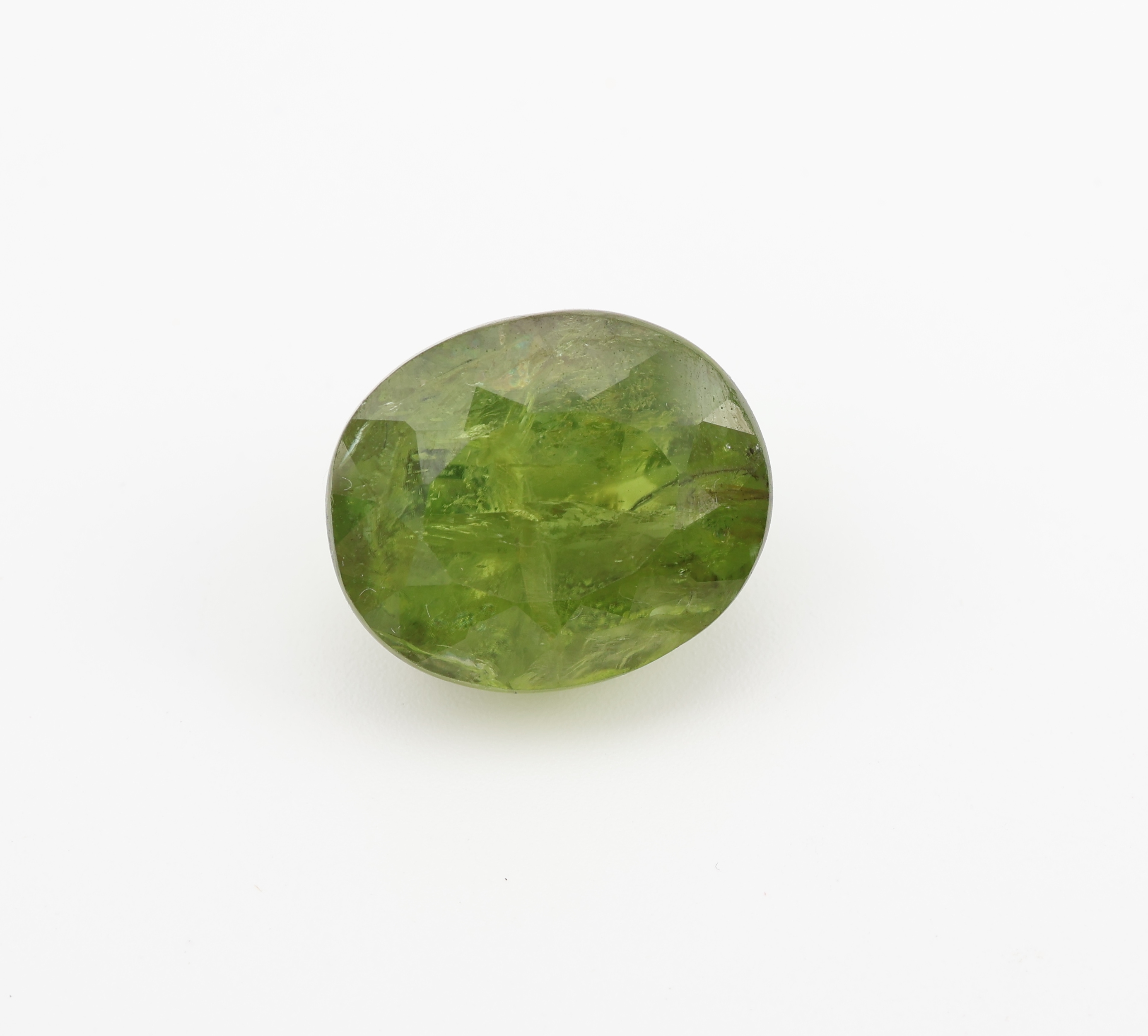 Loser ovalfacett. Peridot, 18.18 ct, Gelb- Grün, 16.08 x 13.55 x 10.73 mm, mit GEM Report