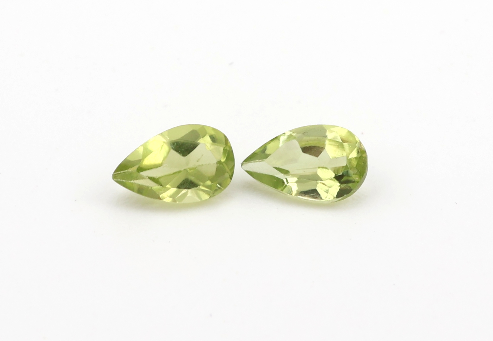 Detail a: Lot lose facett. Peridottropfen, zus. 24.26 ct
