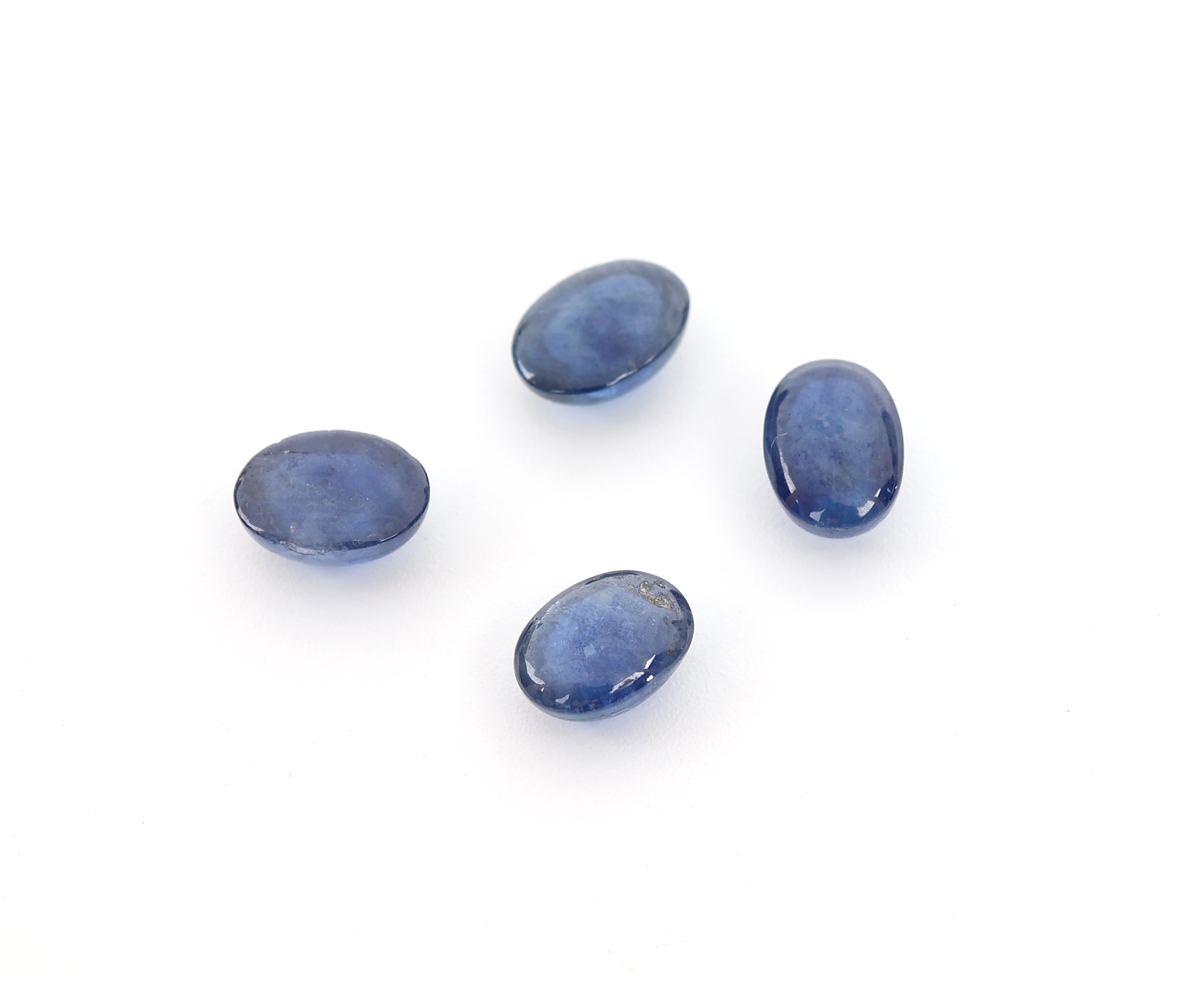 Detail a: Lot 4 lose ovale Saphircabochons, zus. 5.39 ct