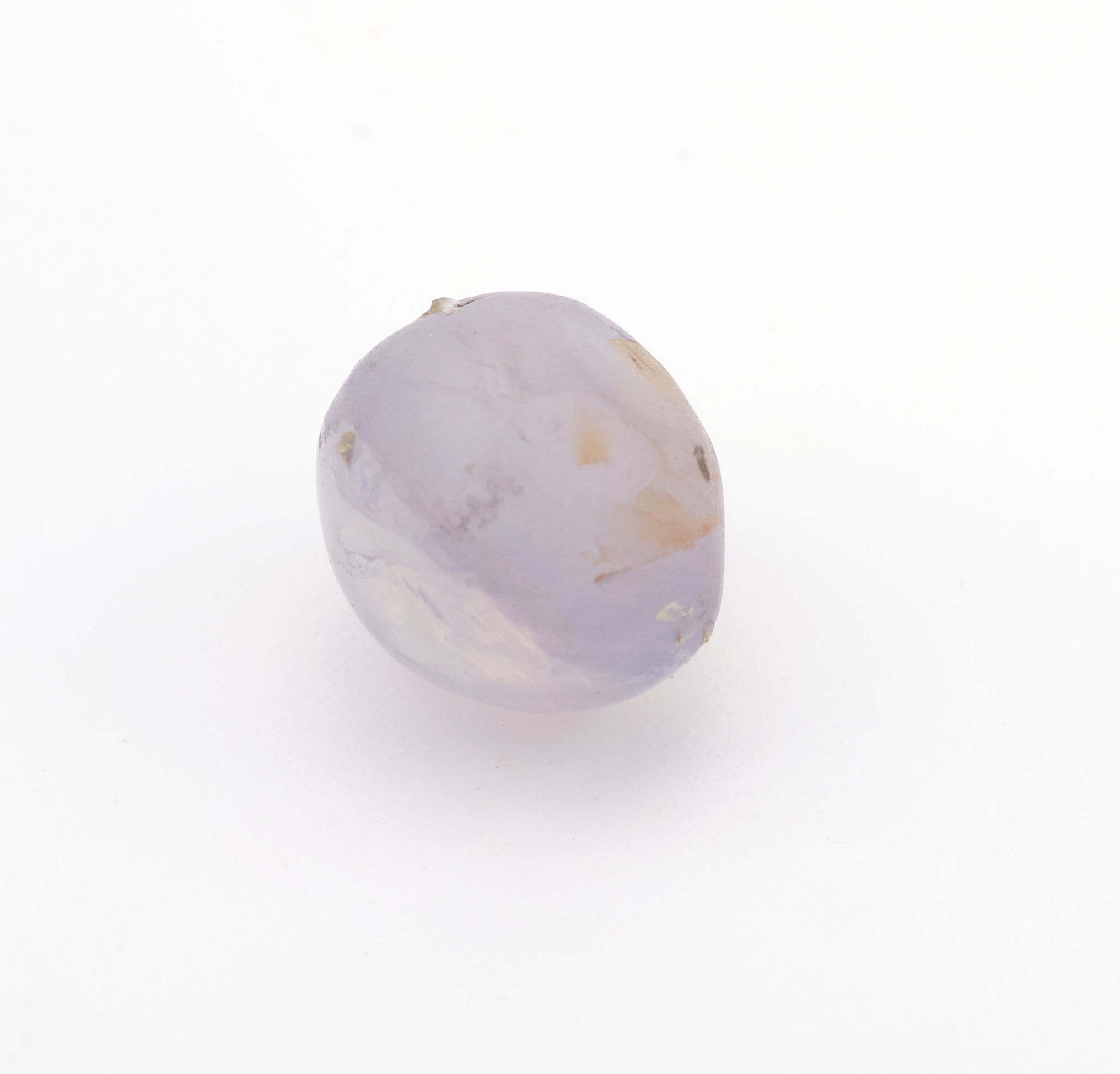 Detail b: Loser ovaler Sternsaphircabochon, 6.86 ct, 9.63 x 8.67 x 7.75 mm, violet, mit GEM Report,unbeh., Fundort Myanmar (Burma)