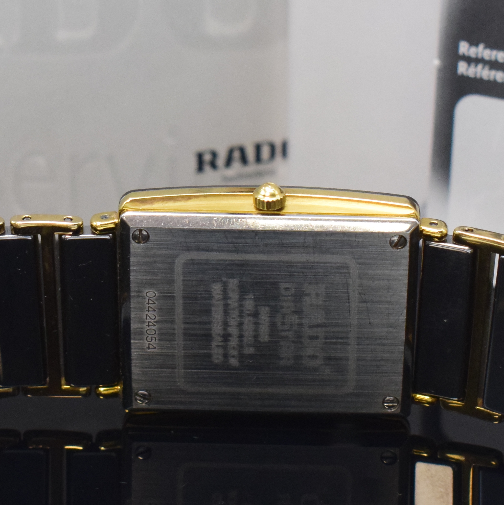 Detail d: RADO Diastar Herrenarmbanduhr Referenz 160.0282.3, quarz, Geh. in Stahl teils verg., Keramik-Gliederband m. dopp. Faltschl., Boden 4-fach verschr., ...