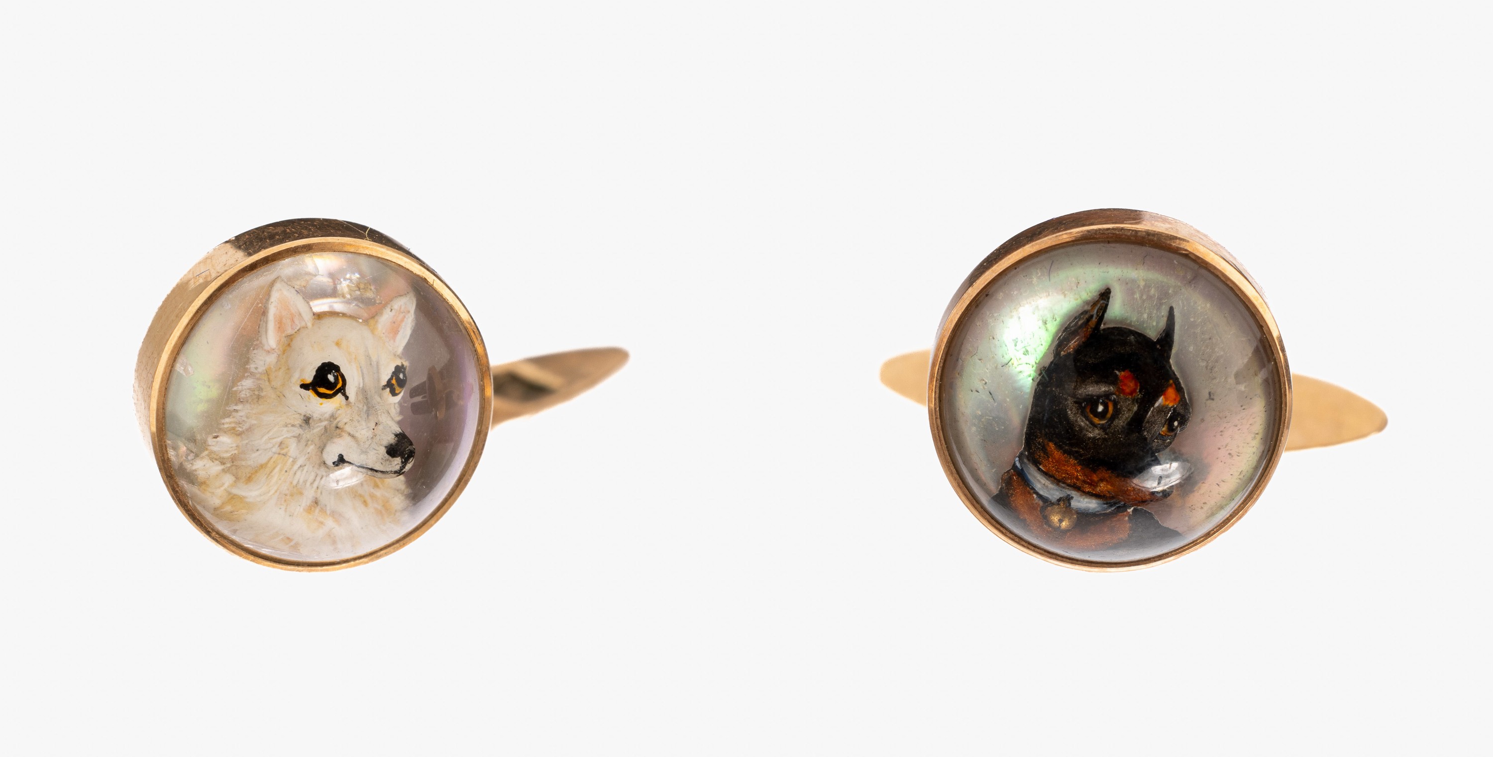 Paar 14 kt Gold Manschettenknöpfe, RoseG 585/000, Österreich/Wien, 2 sogn. Essex Crystals, Darstellung zweier Hunde, ca. 7.0 g