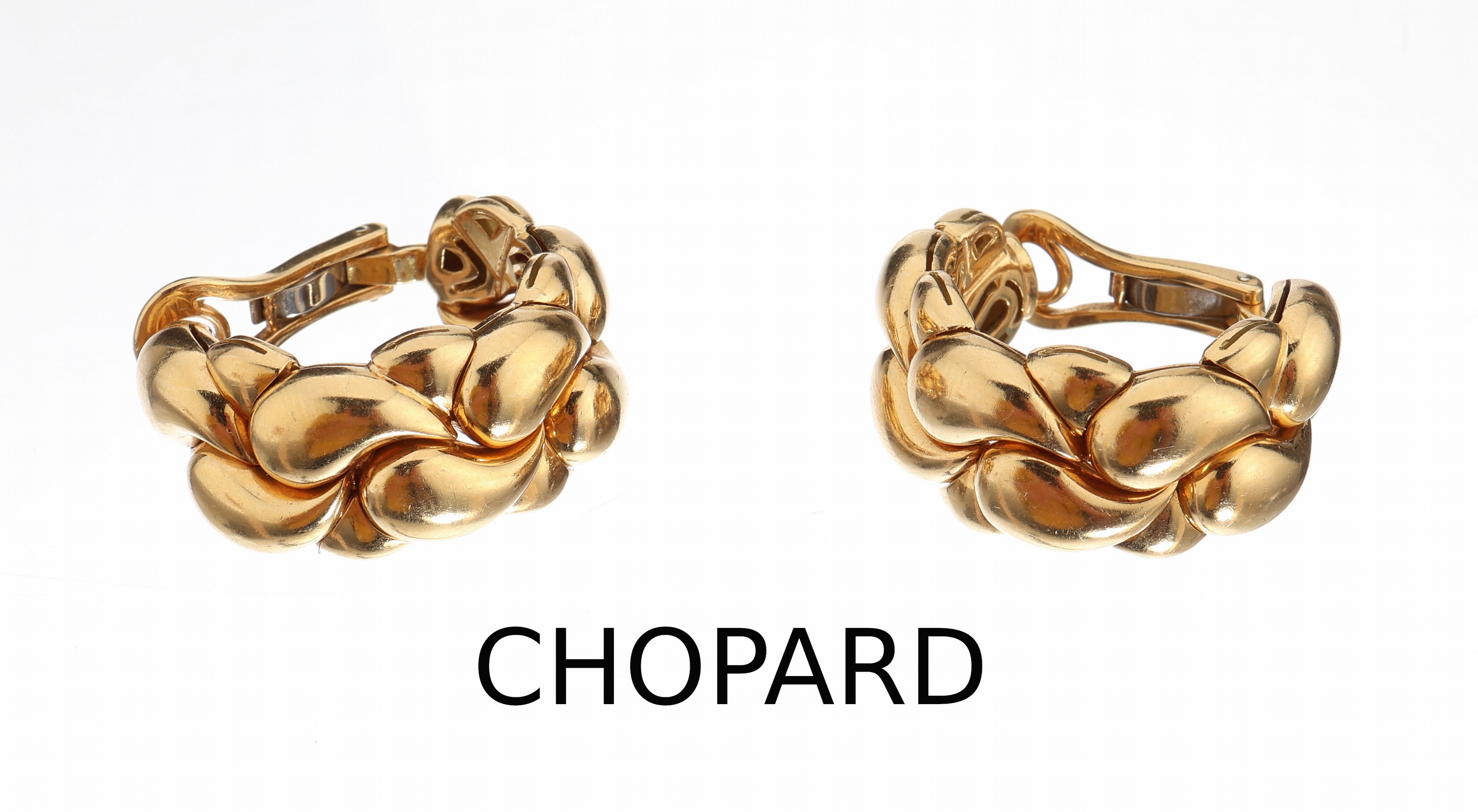 Paar 18 kt Gold CHOPARD Ohrclips, GG 750/000, aus der Serie Casmir, ca. 34.8 g, sign.