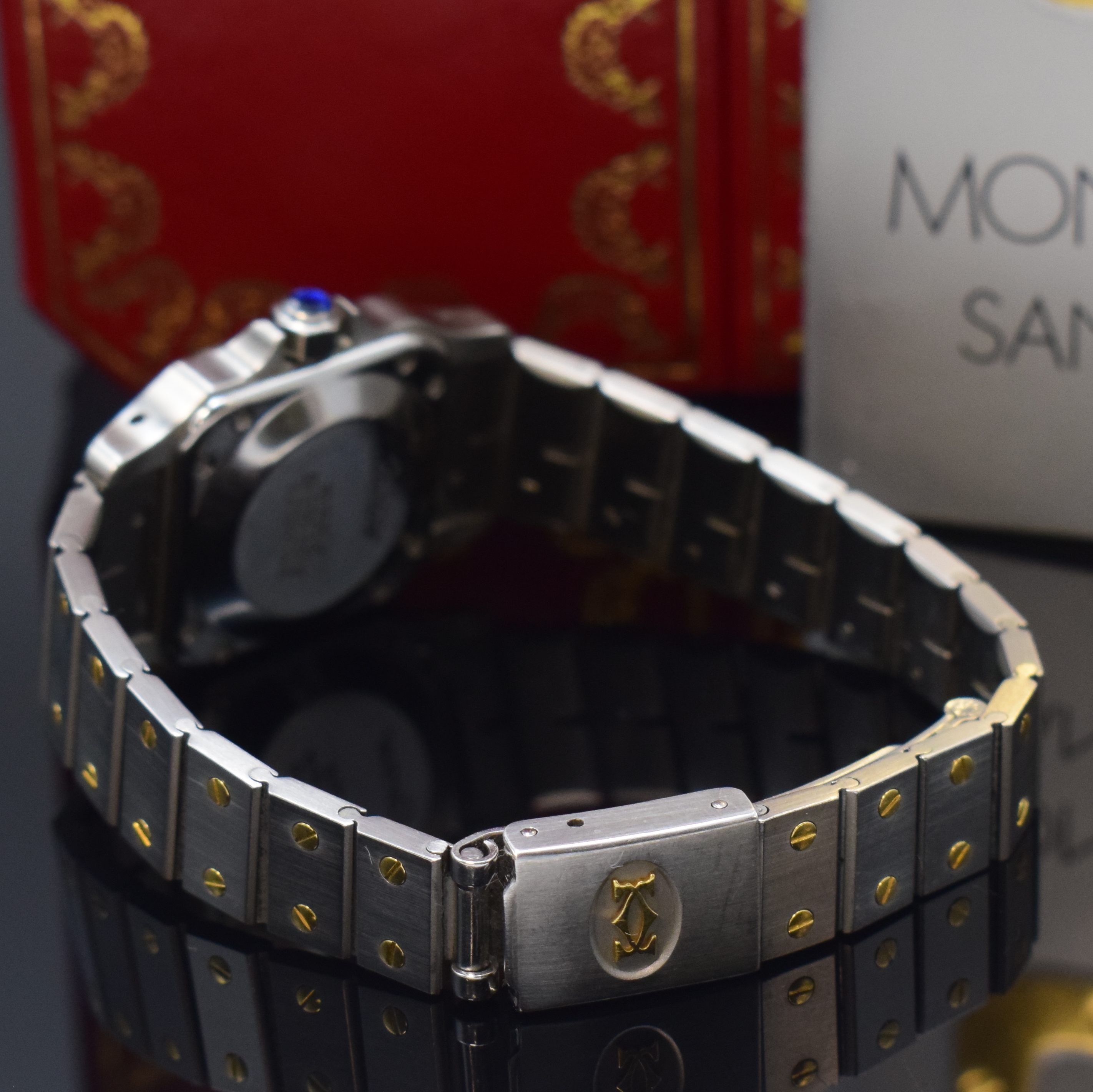 Detail b: CARTIER Santos Damenarmbanduhr in Stahl/Gold, Schweiz um 1990, Automatik, orig. Gliederband m. Faltschl., Boden 8-fach verschr., Schmuckkrone, ...