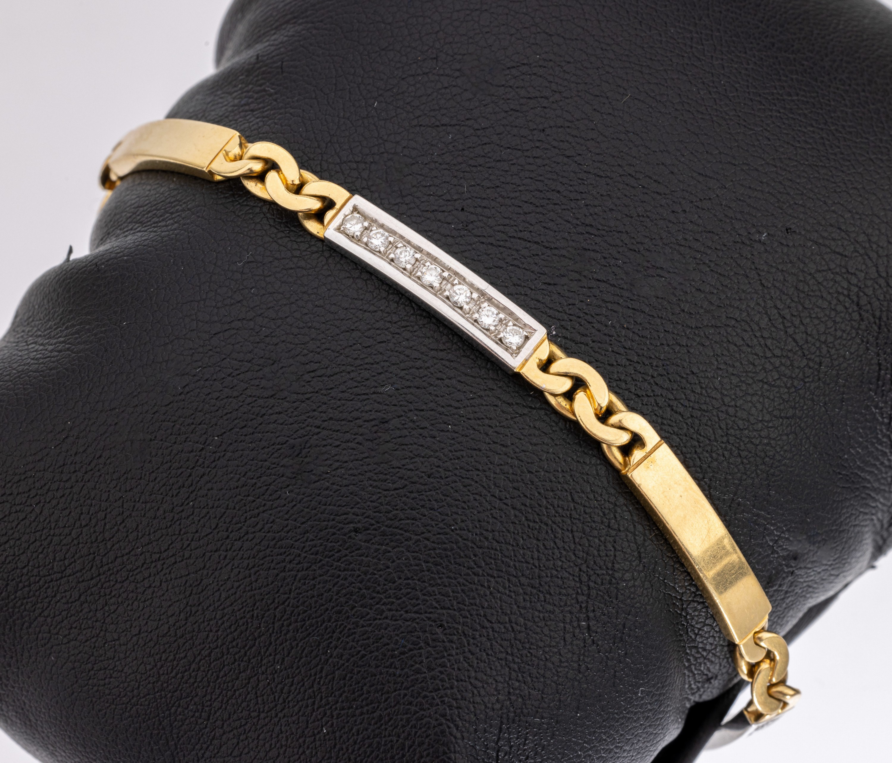 18 kt Gold Brillant-Armband, GG/WG 750/000,Zwischenglieder in WG bes. mit 21 Brillanten zus. ca. 0.42 ct Weiss/si, L. ca. 18.8 cm, Kastenschloss mit ...