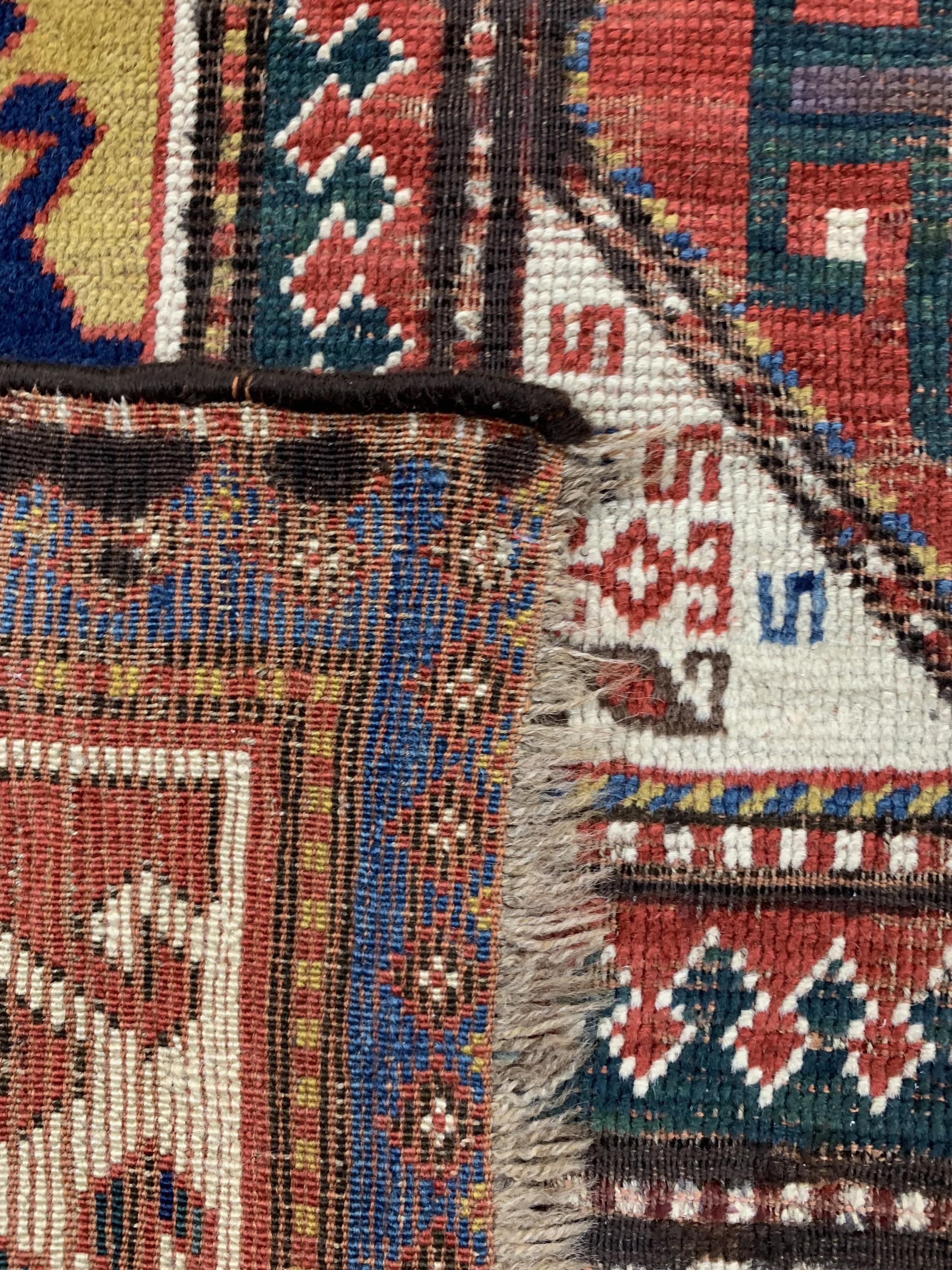 Detail e: "Bordjalou"Kazak antik, Kaukasus, Mitte 19.Jhd, Wolle auf Wolle, ca. 260 x 142 cm, EHZ: 3, (Alte Restaurierung)