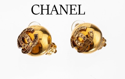 Image Pair of CHANEL ear clips , Made in France, metal gilt, with applied CC symbol, diam. ...