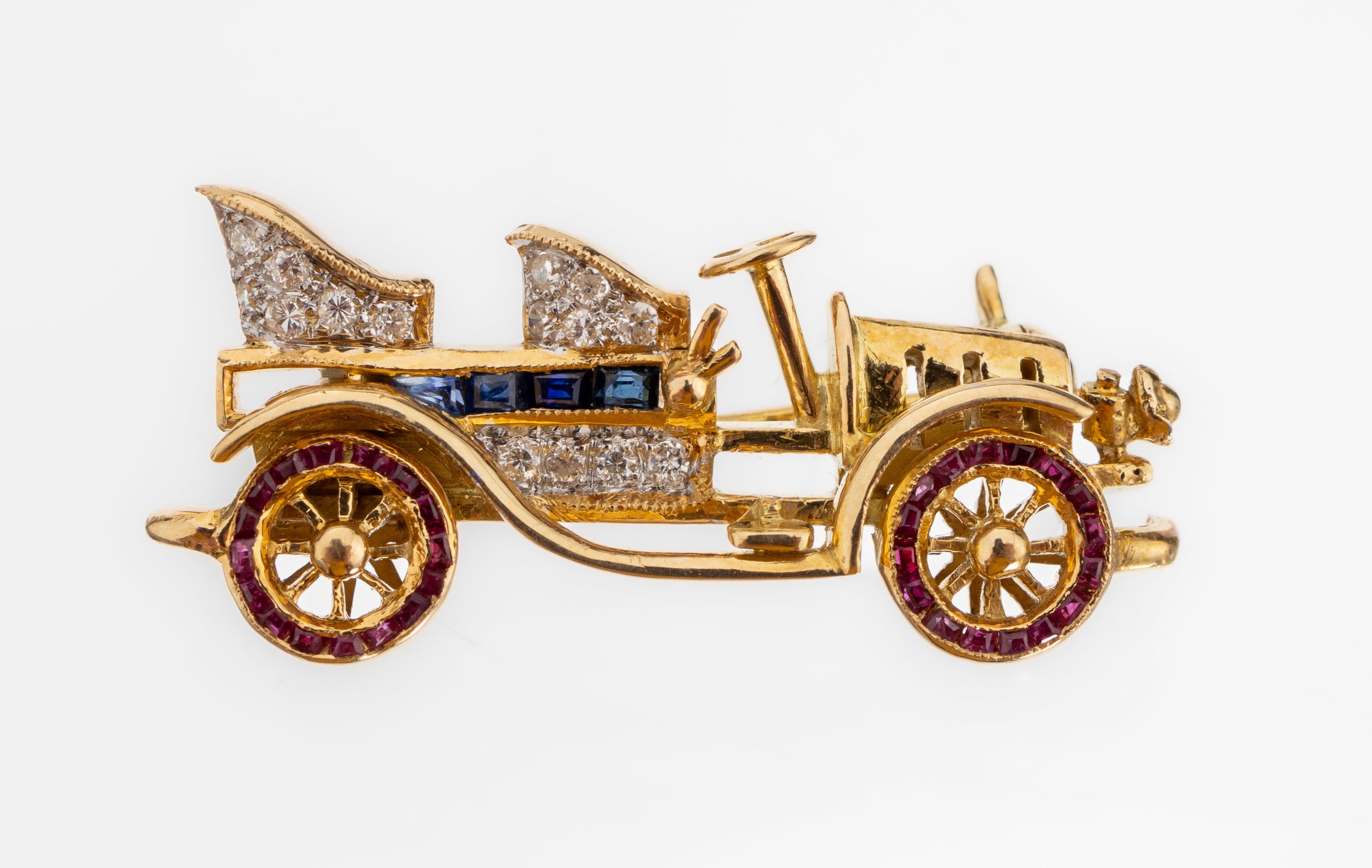 18 kt Gold Brillant-Farbstein-Brosche "Oldtimer", GG 750/000 gepr., 15 Brillantenin rhod. Fassungen zus. ca. 0.10 ct Weiss/si, Räder mit ...