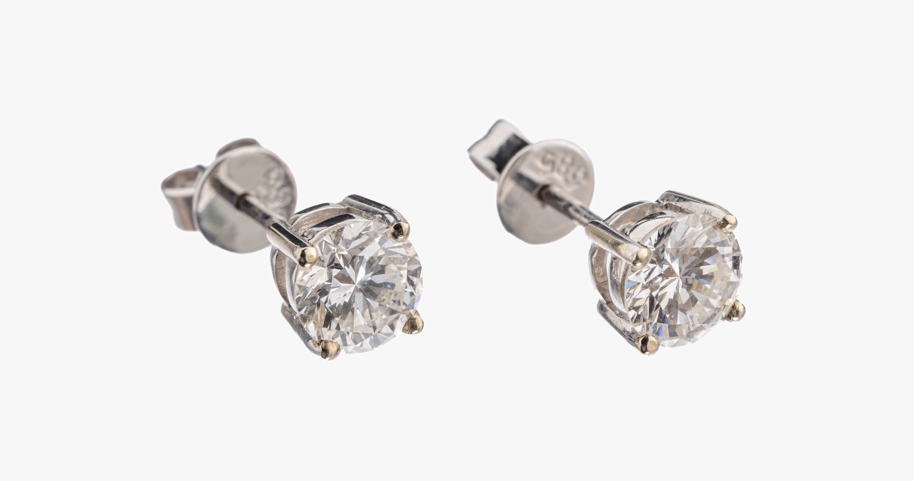 Paar 14 kt Gold Brillant-Ohrstecker, WG 585/000, 2 Brillanten zus. ca. 1.03 ct Weiss/si
