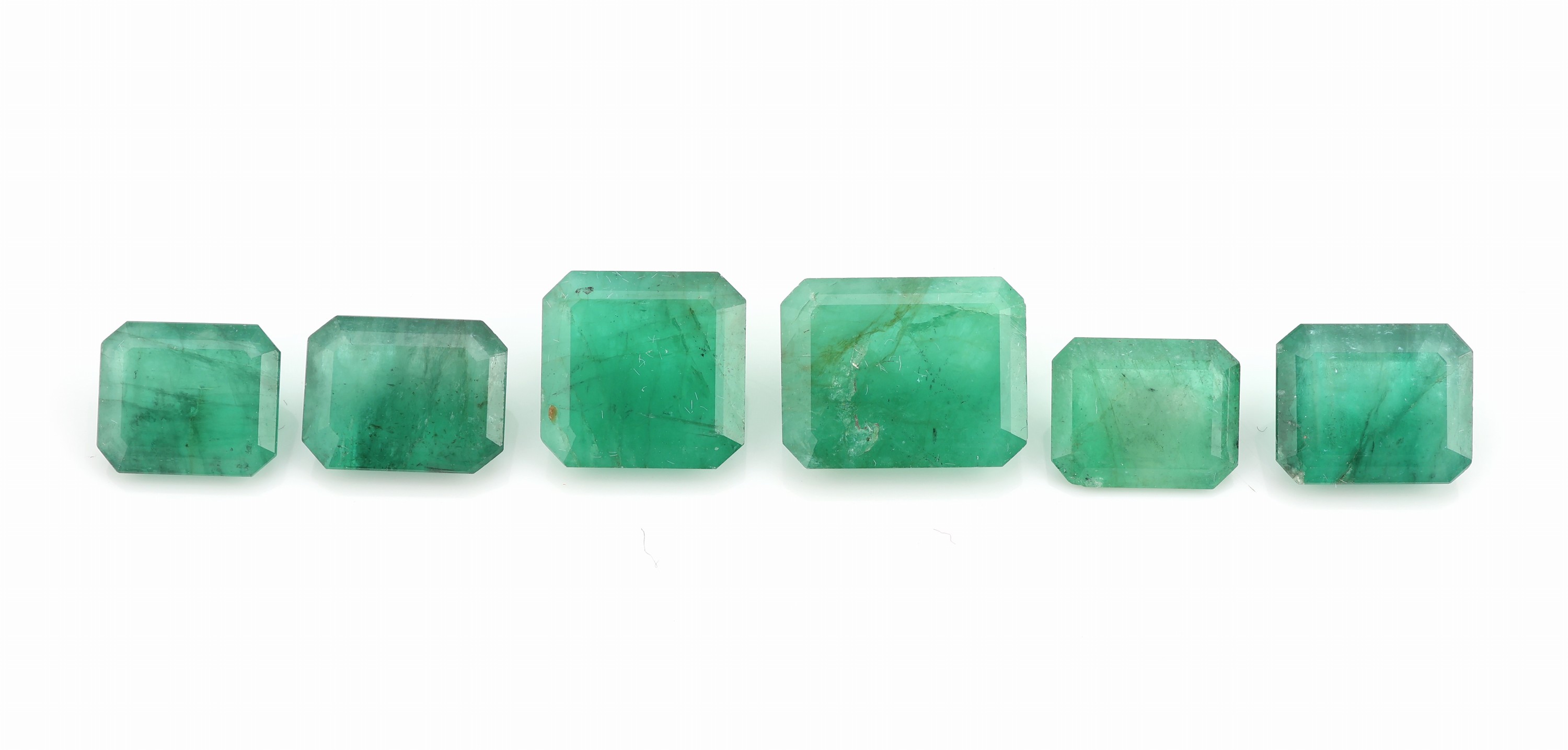 Lot 6 lose Smaragde im Emerald Cut zus. 15.36 ct
