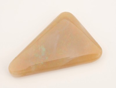 Image Loose opal-triangle 85.70 ct , luminous green and red, approx. 6.5 x 3.5 cm