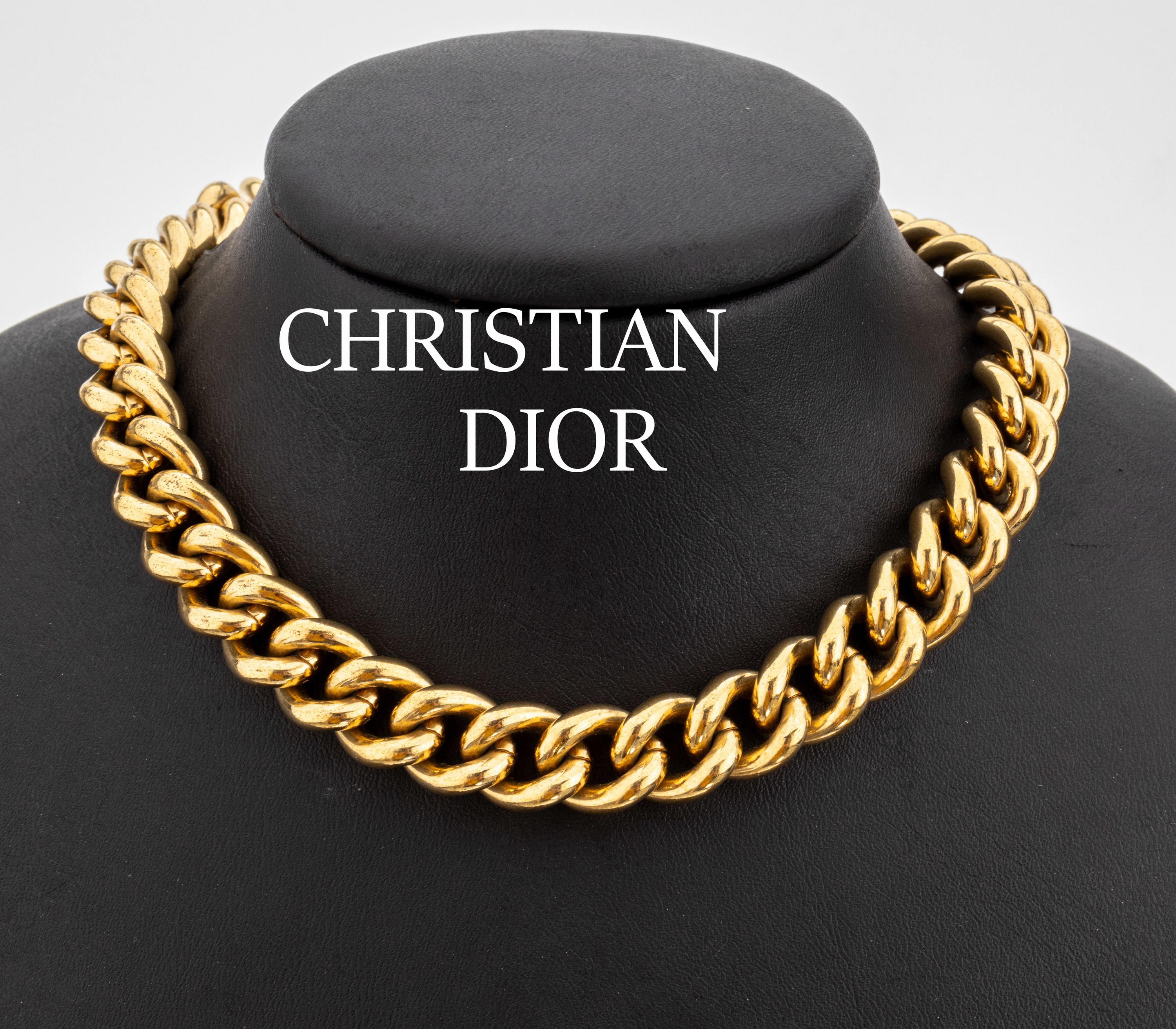 CHRISTIAN DIOR Collier, Metall verg., schwere massive Ausführung, L. ca. 45 cm, sign.