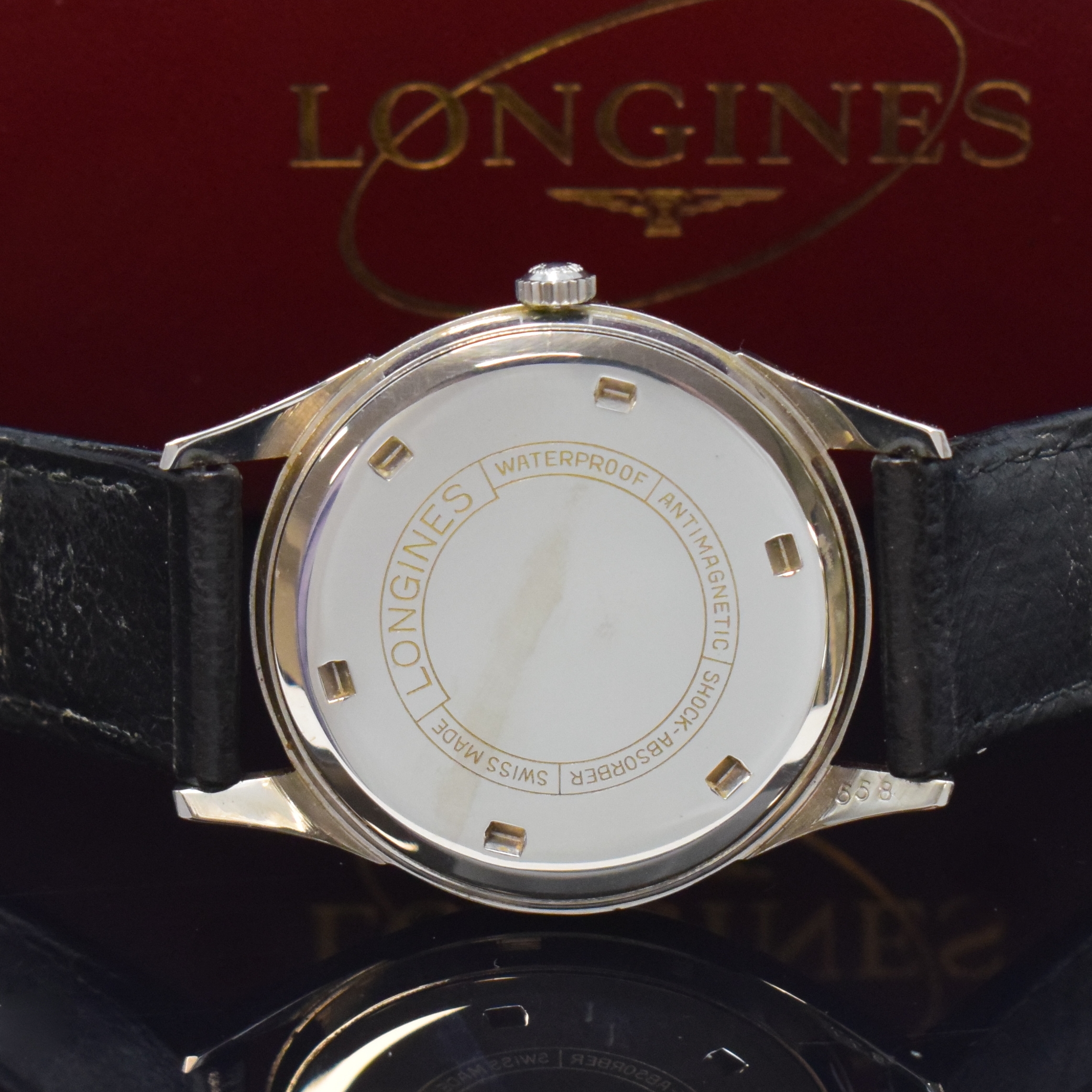 Detail d: LONGINES Herrenarmbanduhr in Stahl, Schweiz um 1964, Handaufzug, neutr. Lederband m. orig. Dornschl., silb. Zifferbl. m. silb. Std.-Ind., silb. ...