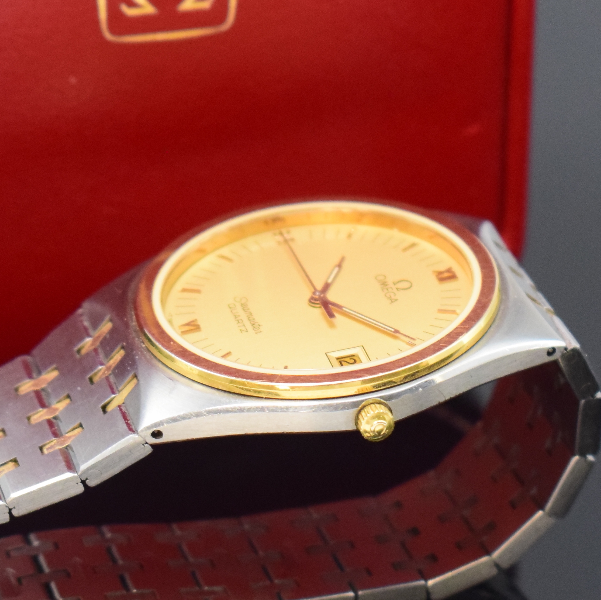 Detail c: OMEGA Seamaster Herrenarmbanduhr in Stahl/Gold Referenz 196.0275/396.0964, Schweiz um 1985, quarz, orig. Gliederband m. Faltschl., Boden aufgedr., ...