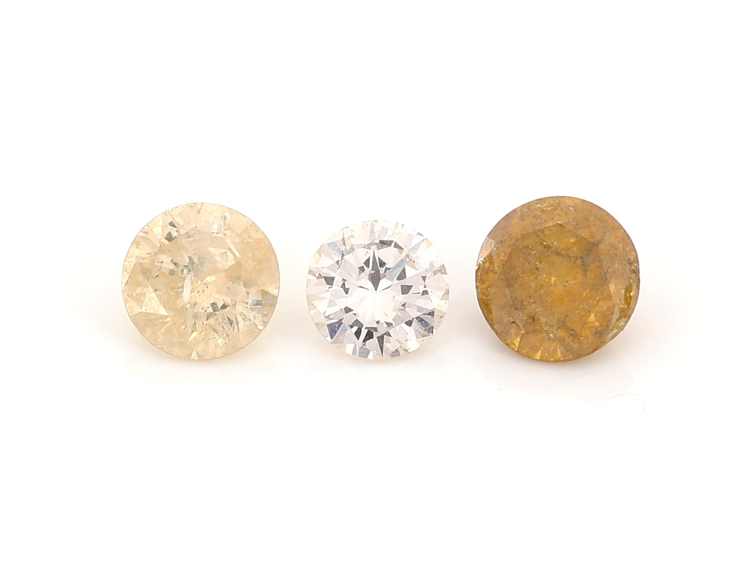 Lot 3 lose Brillanten zus. ca. 0.95 ct Weiss-fancy colour/p