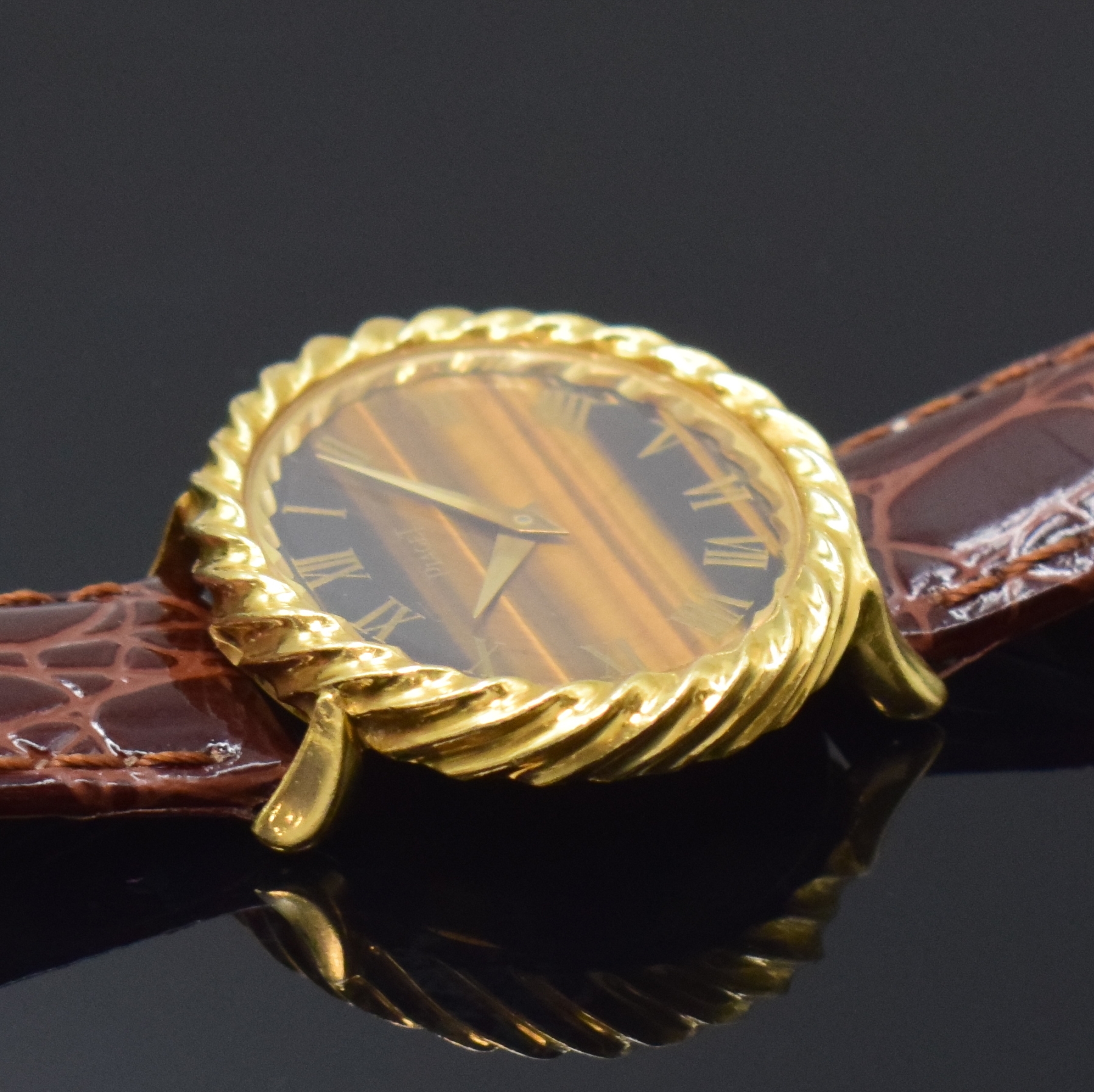 Detail c: PIAGET Damenarmbanduhr in GG 750/000 Referenz 9803, Schweiz um 1960, Handaufzug, ovales Geh., Boden 2-fach verschr., Tigerauge- Zifferbl. m. röm. ...