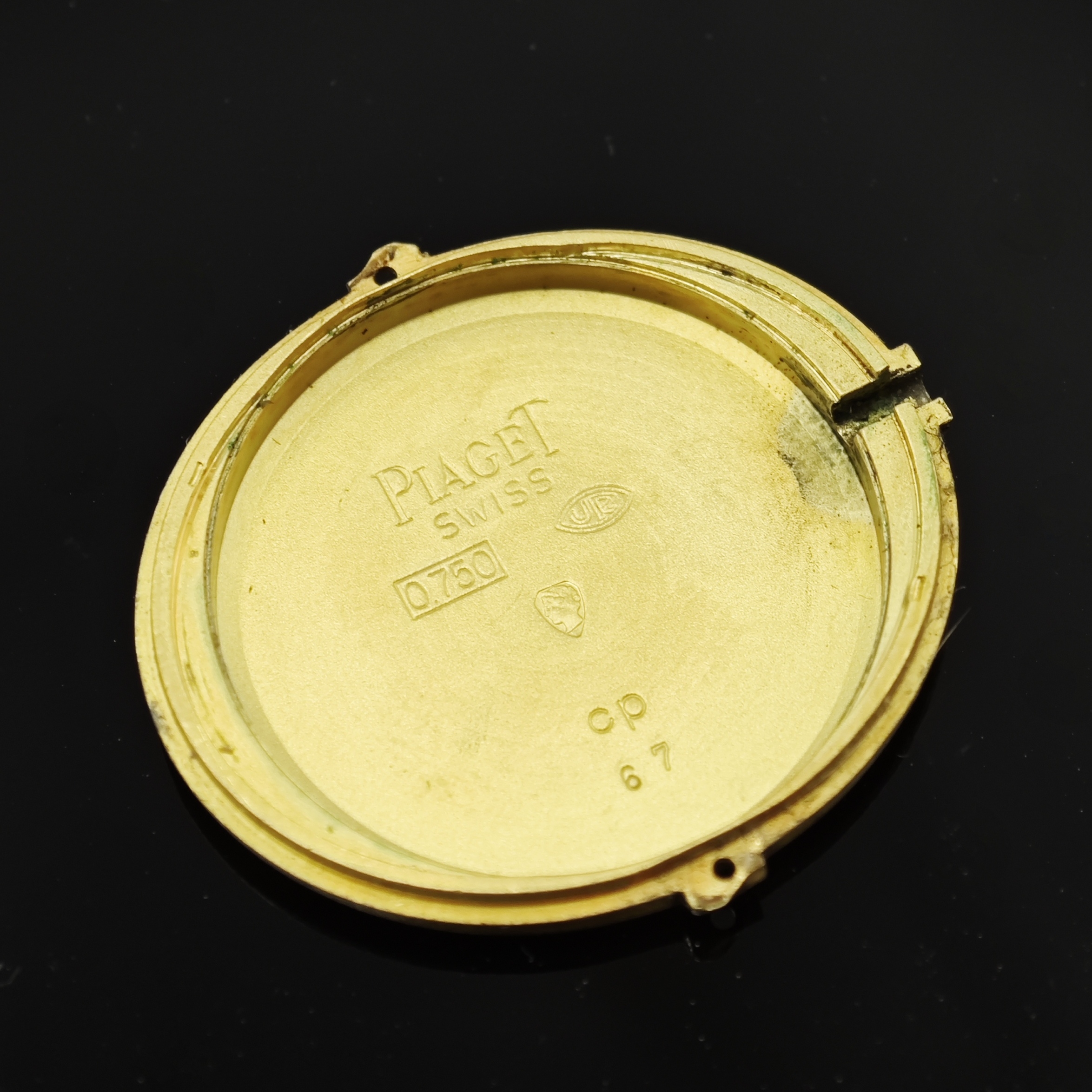 Detail e: PIAGET Damenarmbanduhr in GG 750/000 Referenz 9803, Schweiz um 1960, Handaufzug, ovales Geh., Boden 2-fach verschr., Tigerauge- Zifferbl. m. röm. ...
