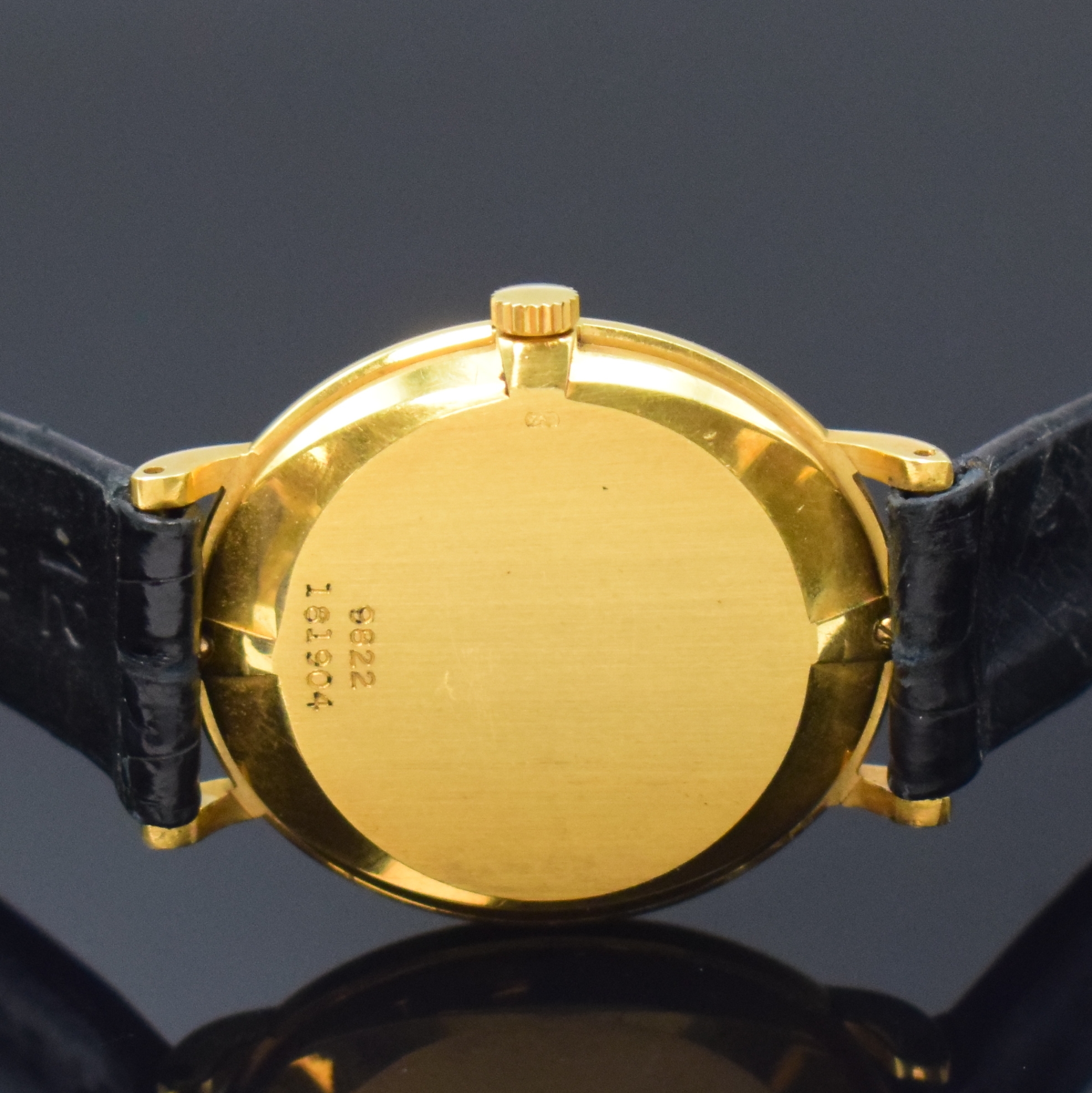 Detail e: PIAGET Damenarmbanduhr in GG 750/000 Referenz 9822, Schweiz um 1960, Handaufzug, Boden 2-fach verschr., orig. Lederband m. Dornschl. in GG 750/000, ...