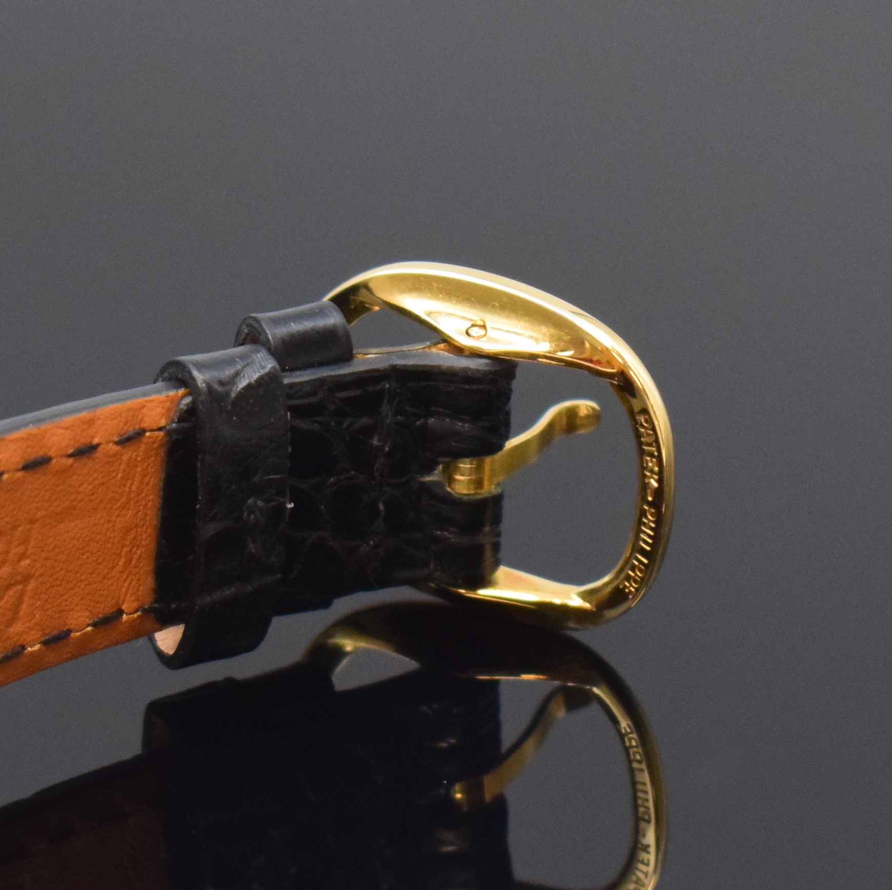Detail b: PATEK PHILIPPE Armbanduhr Modellserie Ellipse d'Or Referenz 3788, Schweiz um 1990, quarz, Geh. in GG 750/000 inkl. neutr. Lederband m. orig. ...
